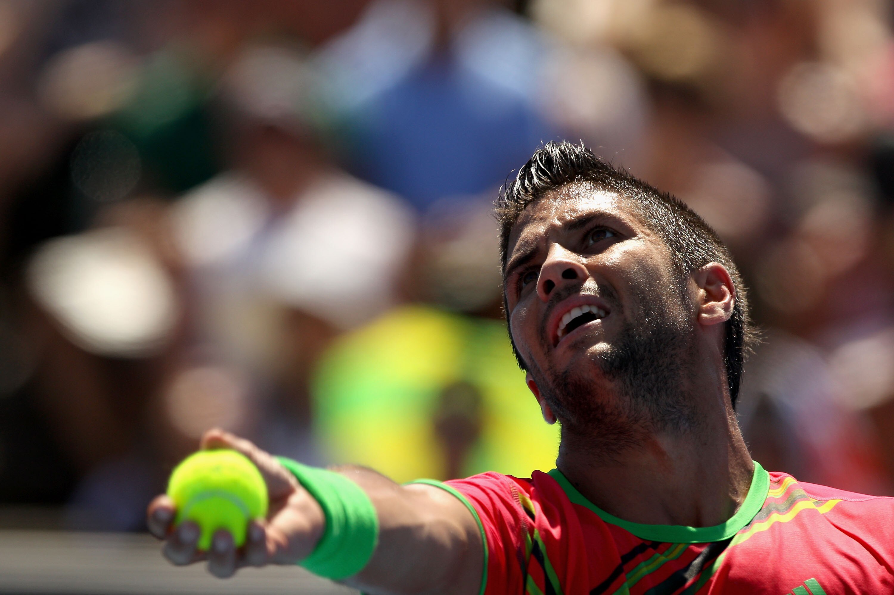 MELBOURNE, AUSTRALIA - JANUARY 23:  Fernando Verdasco of Spain serves in his fourth round match against Tomas Berdych of the Czech Republic during day seven of the 2011 Australian Open at Melbourne Park on January 23, 2011 in Melbourne, Australia.  (Photo