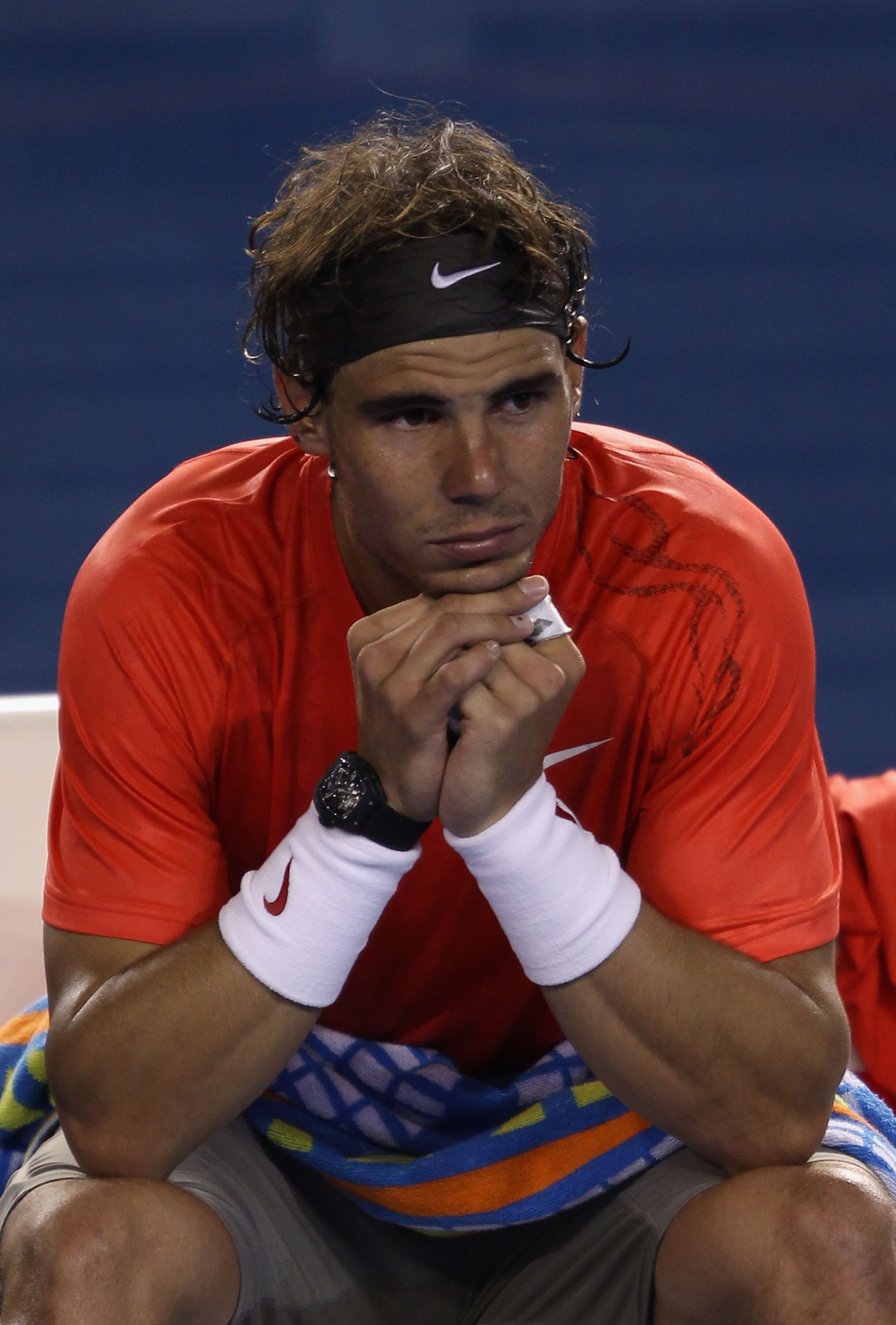 MELBOURNE, AUSTRALIA - JANUARY 26:  Rafael Nadal of Spain shows his emotions betweein games in his quarterfinal match against David Ferrer of Spain during day ten of the 2011 Australian Open at Melbourne Park on January 26, 2011 in Melbourne, Australia.