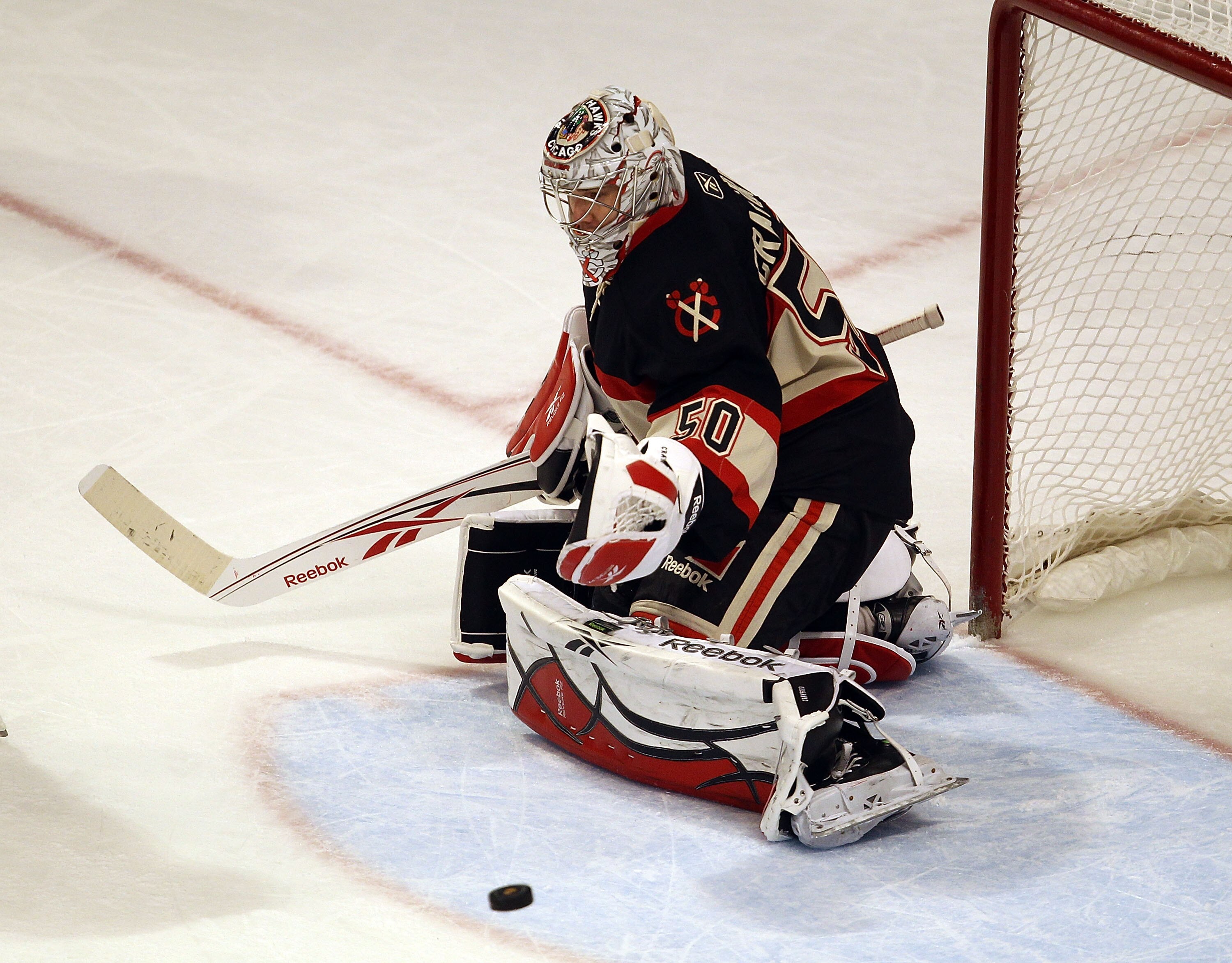 CHICAGO, IL - JANUARY 25: Corey Crawford #50 of the Chicago Blackhawks makes a save against the Minnesota Wild at the United Center on January 25, 2011 in Chicago, Illinois. The Wild defeated the Blackhawks 4-2. (Photo by Jonathan Daniel/Getty Images)