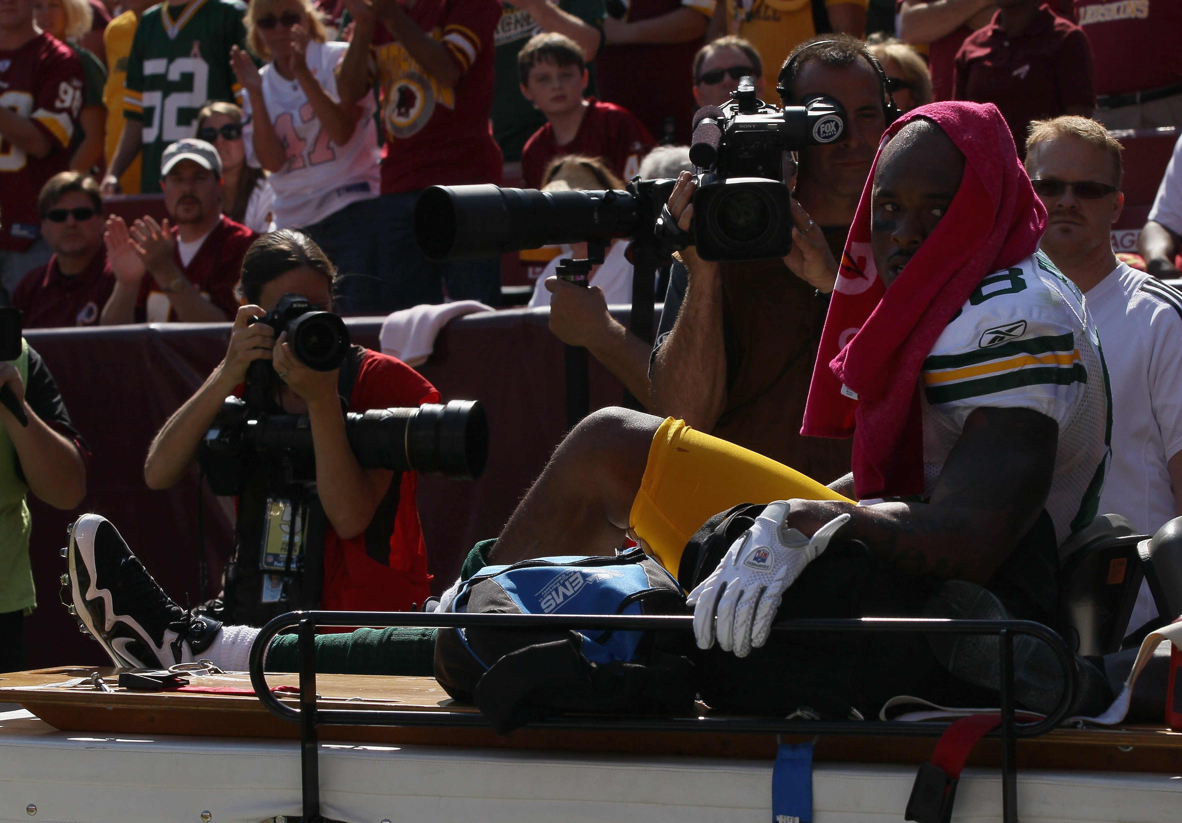 LANDOVER, MD - OCTOBER 10:  Tight end Jermichael Finley #88 of the Green Bay Packers leaves the game on a cart after injuring his knee against the Washington Redskins at FedExField on October 10, 2010 in Landover, Maryland. The Redskins won the game in ov