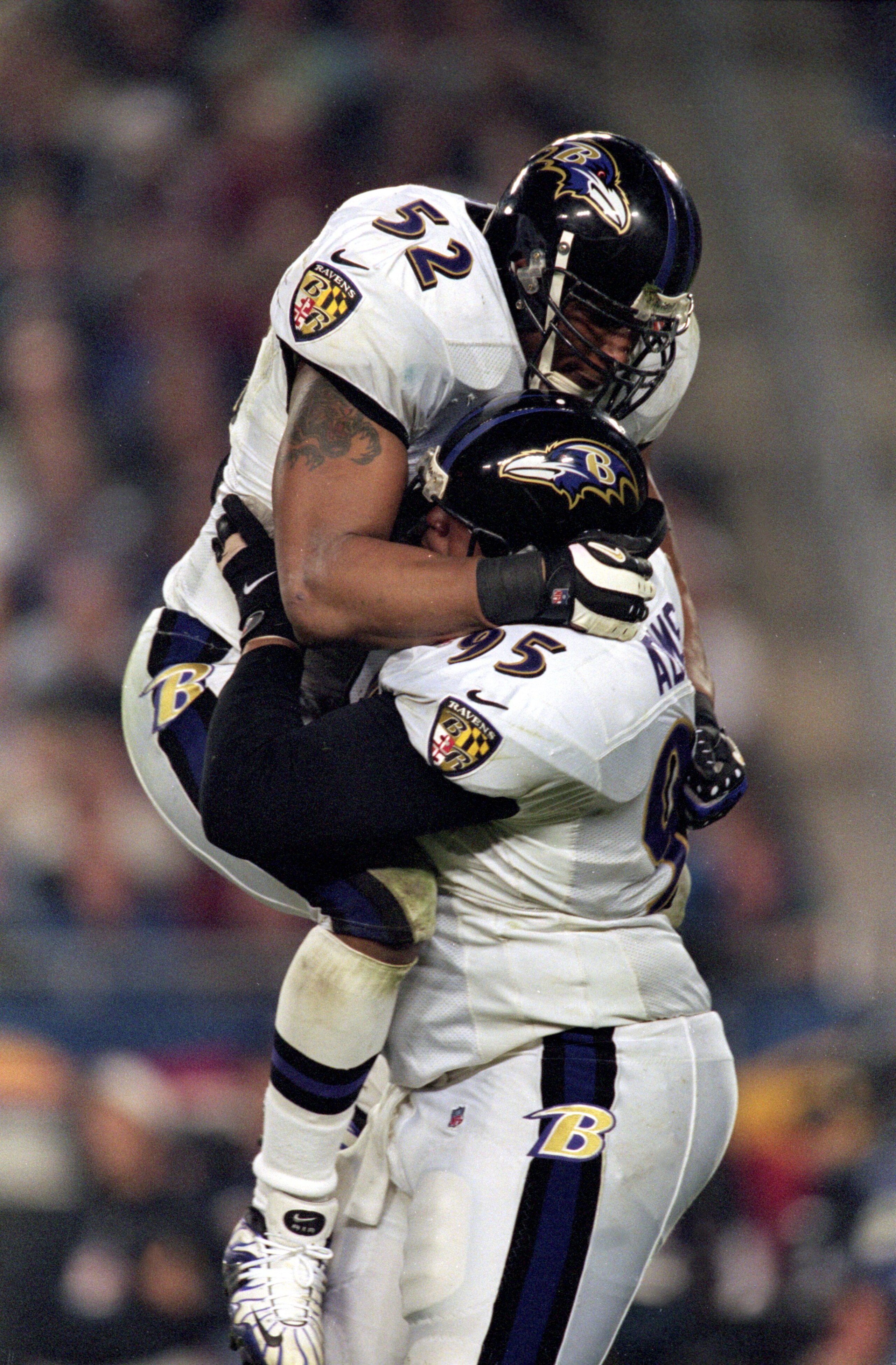28 Jan 2001: Ray Lewis #52 of the Baltimore Ravens leaps up and hugs teammate Sam Adams #95 after the Super Bowl XXXV Game against the New York Giants at the Raymond James Stadium in Tampa, Florida. The Ravens defeated the Giants 34-7.Mandatory Credit: A 28 Jan 2001: Ray Lewis #52 of the Baltimore Ravens leaps up and hugs teammate Sam Adams #95 after the Super Bowl XXXV Game against the New York Giants at the Raymond James Stadium in Tampa, Florida. The Ravens defeated the Giants 34-7.Mandatory Credit: A