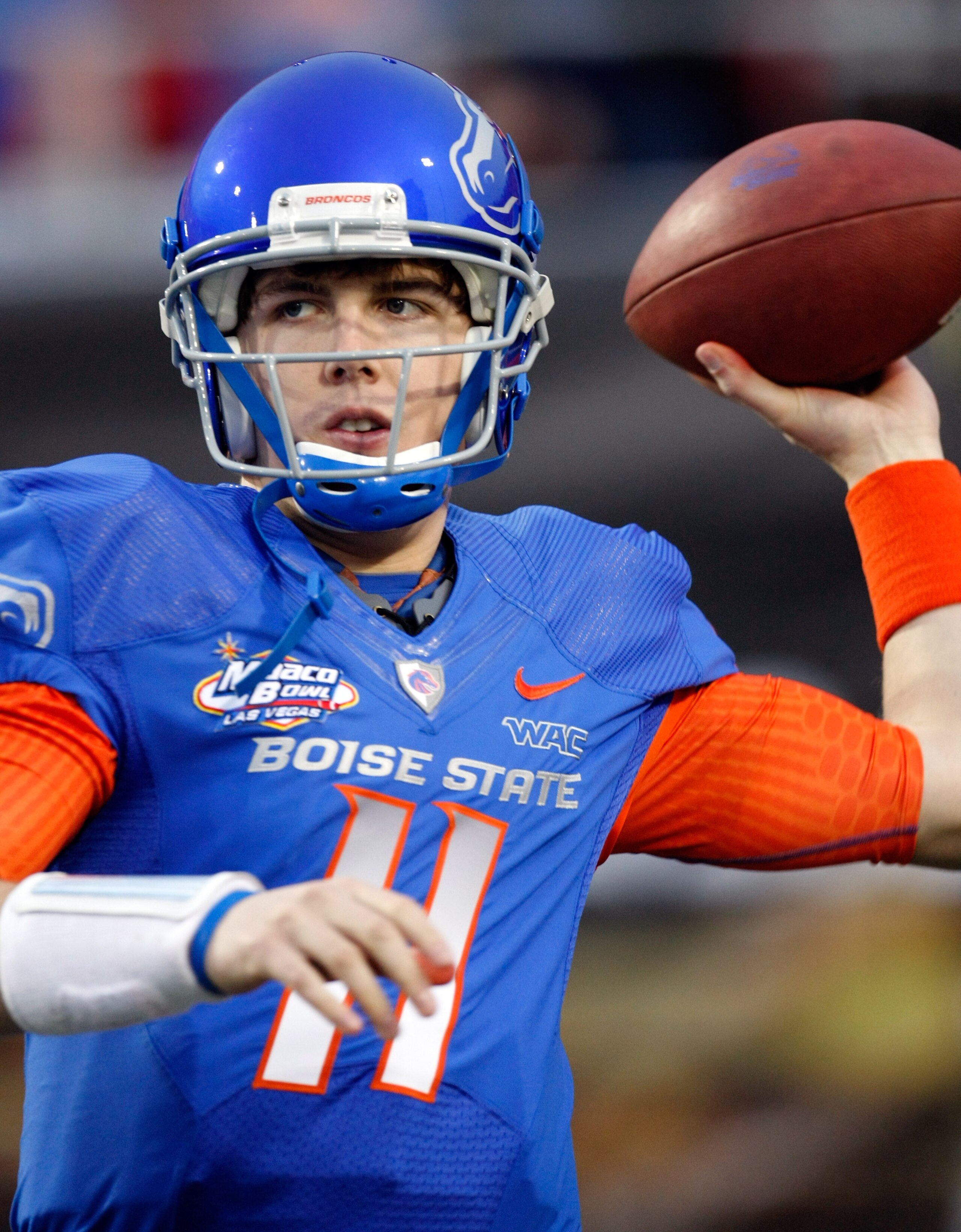 LAS VEGAS, NV - DECEMBER 22:  Quarterback Kellen Moore #11 of the Boise State Broncos warms up before playing against the Utah Utes in the MAACO Bowl Las Vegas at Sam Boyd Stadium December 22, 2010 in Las Vegas, Nevada. Boise State Won 26-3.  (Photo by Et