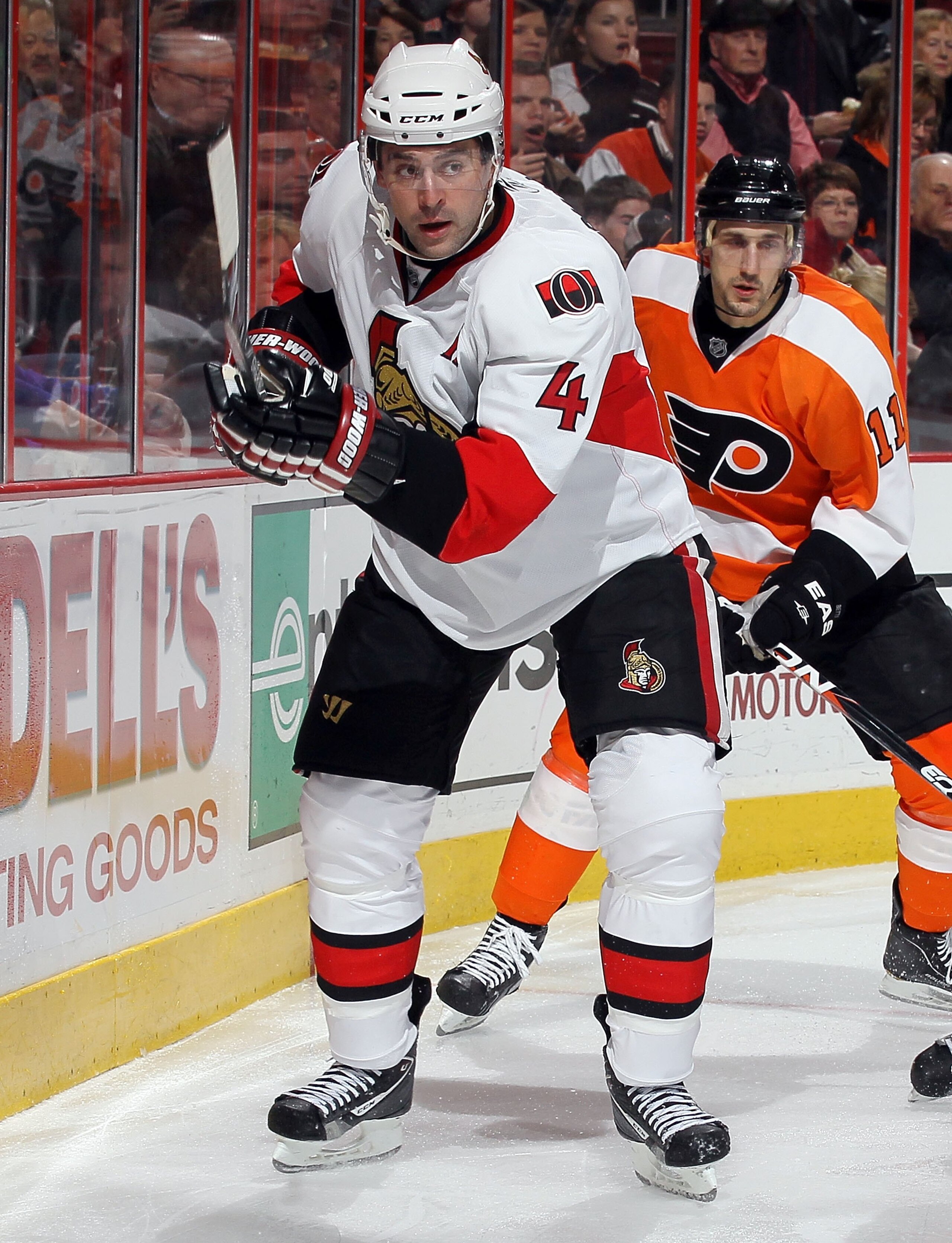 PHILADELPHIA, PA - JANUARY 20:  Chris Phillips #4 of the Ottawa Senators skates against the Philadelphia Flyers on January 20, 2011 at Wells Fargo Center in Philadelphia, Pennsylvania.  (Photo by Jim McIsaac/Getty Images)