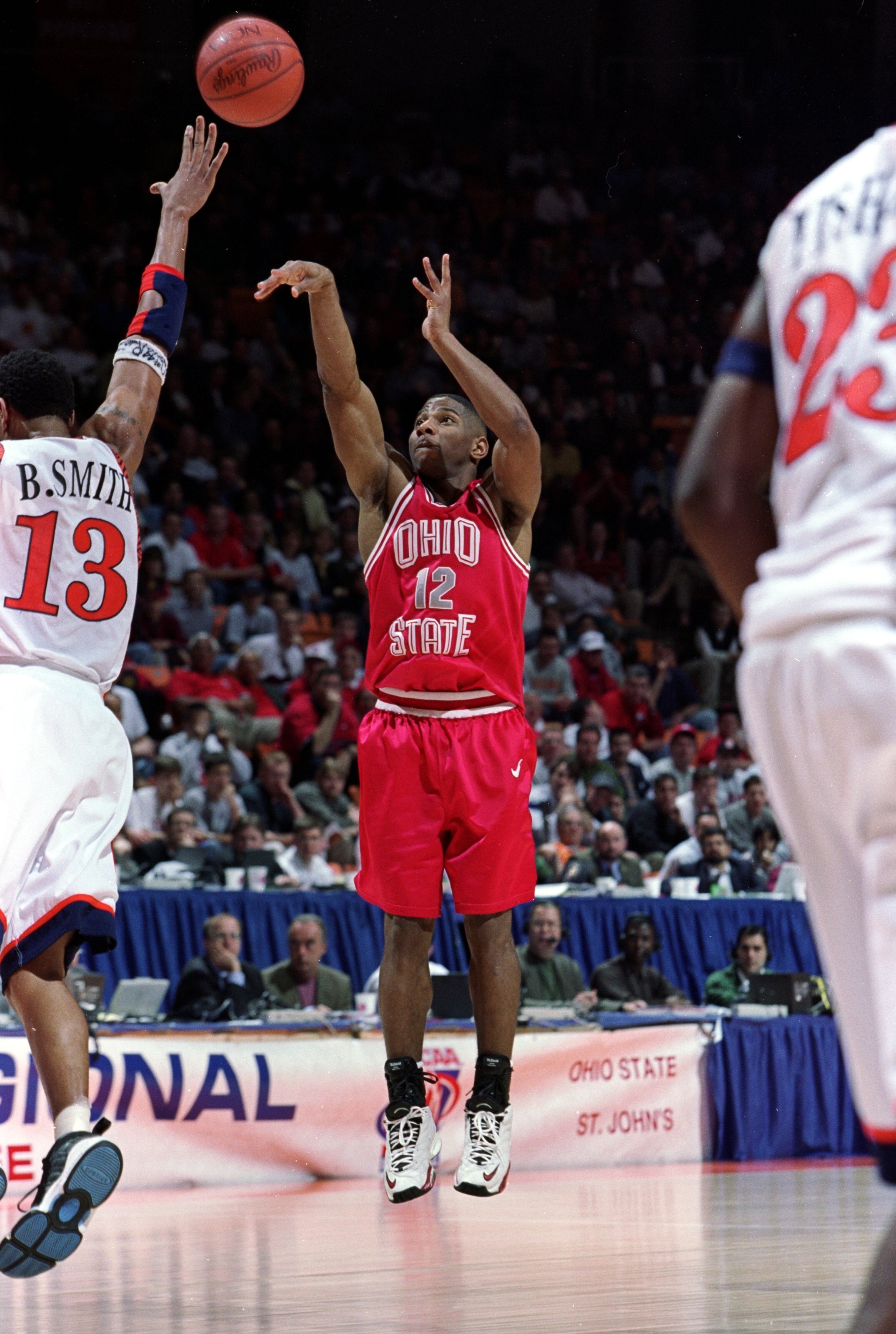 18 Mar 1999: Scoonie Penn #12 of Ohio State shoots over defender Bryant Smith #13 of Auburn during the third round of the NCAA Men's College Basketball Tournament at the Thompson-Boling Arena in Knoxville, Tennessee. Mandatory Credit: Todd Warshaw  /Allsp