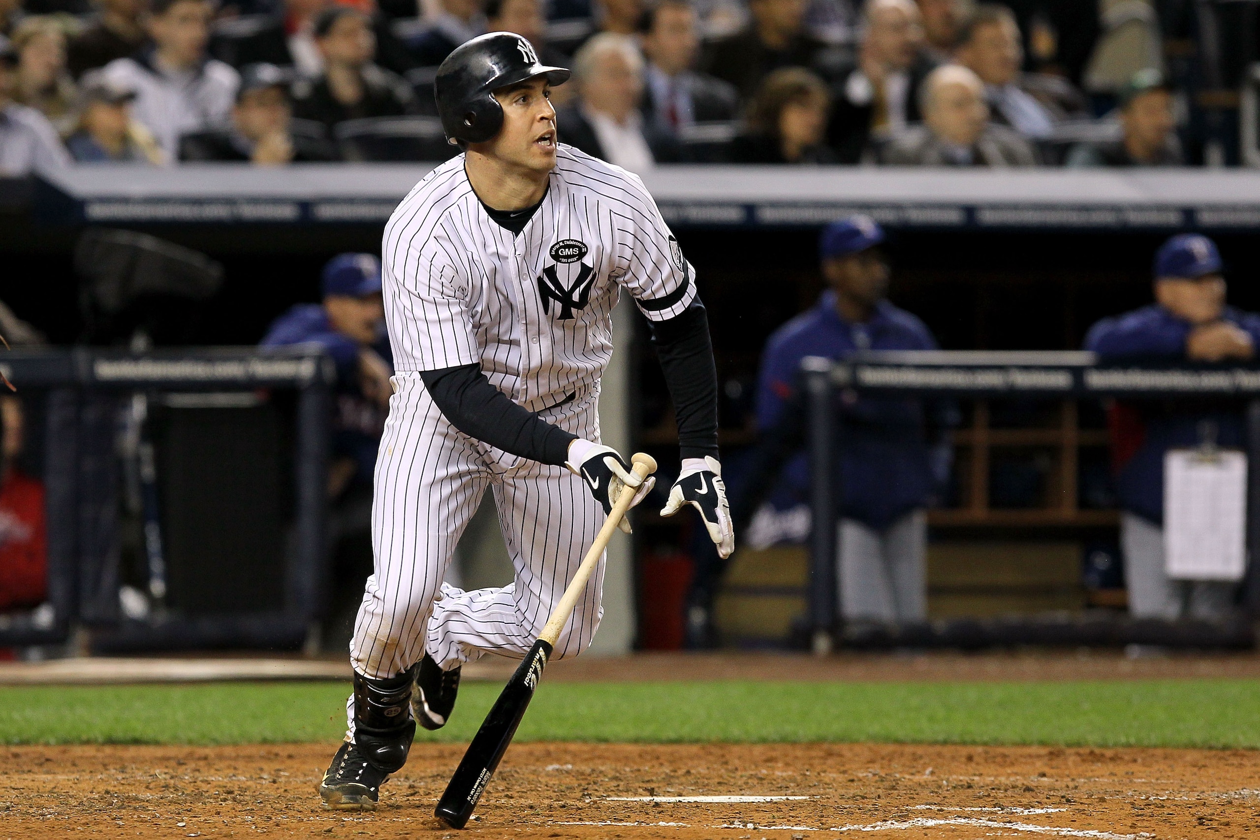 NEW YORK - OCTOBER 19:  Mark Teixeira #25 of the New York Yankees bats against the Texas Rangers in Game Four of the ALCS during the 2010 MLB Playoffs at Yankee Stadium on October 19, 2010 in the Bronx borough of New York City. The Rangers won 10-3.  (Pho