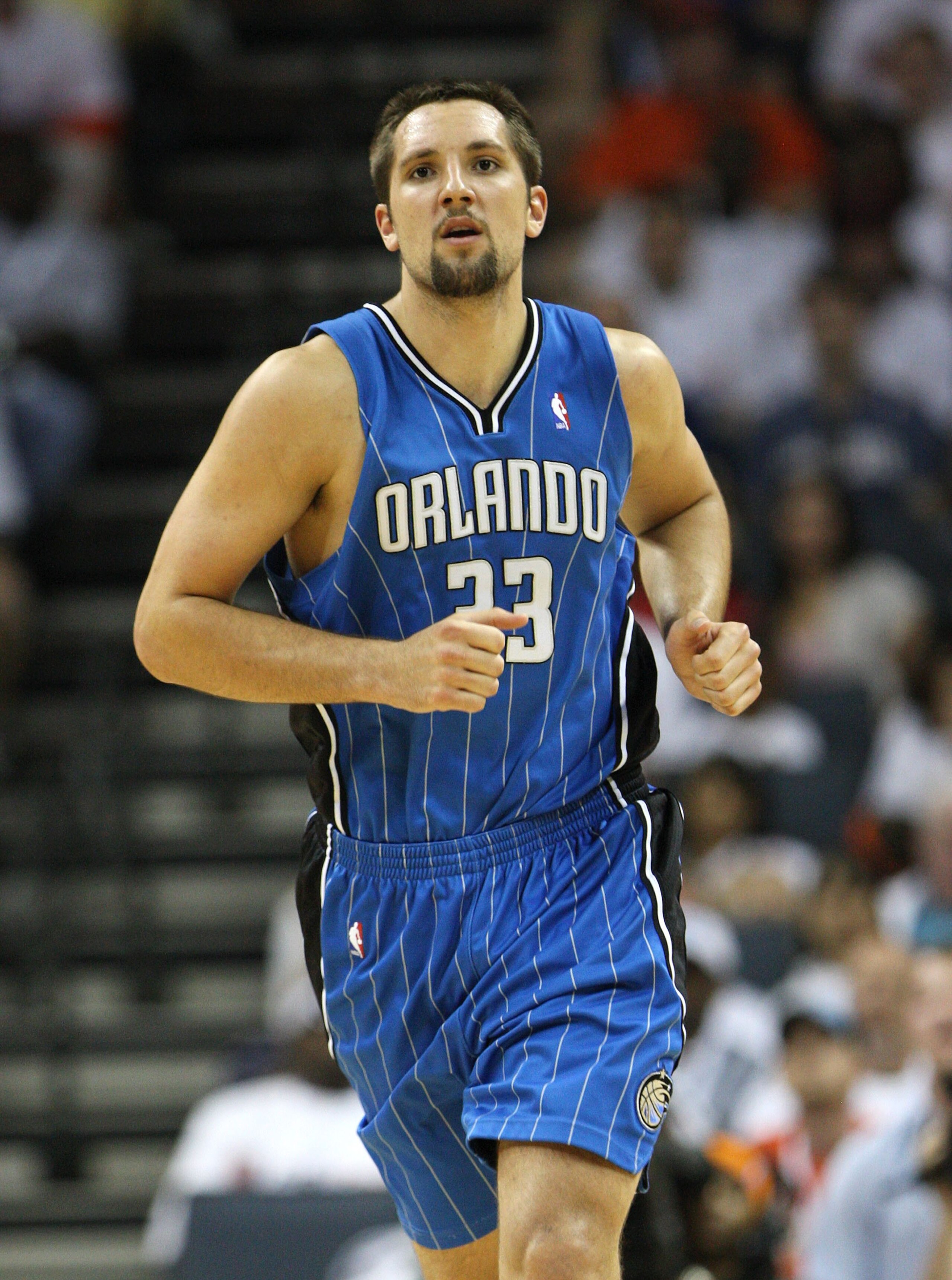 CHARLOTTE - APRIL 24: Forward Ryan Anderson #33 of the Orlando Magic runs upcourt during Game Three of the Eastern Conference Quarterfinals against the Charlotte Bobcats during the 2010 NBA Playoffs at Time Warner Cable Arena on April 24, 2010 in Charlot CHARLOTTE - APRIL 24: Forward Ryan Anderson #33 of the Orlando Magic runs upcourt during Game Three of the Eastern Conference Quarterfinals against the Charlotte Bobcats during the 2010 NBA Playoffs at Time Warner Cable Arena on April 24, 2010 in Charlot