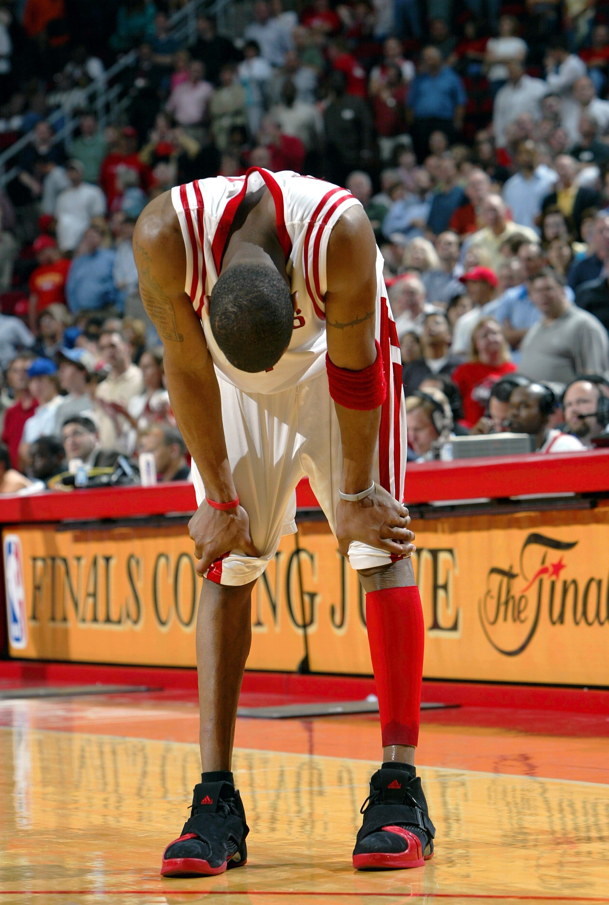 HOUSTON - APRIL 28:  Forward Tracy McGrady #1 of the Houston Rockets hangs his head in the final seconds of a 106-102 loss to the Dallas Mavericks in Game three of the Western Conference Quarterfinals during the 2005 NBA Playoffs on April 28, 2005 at the 