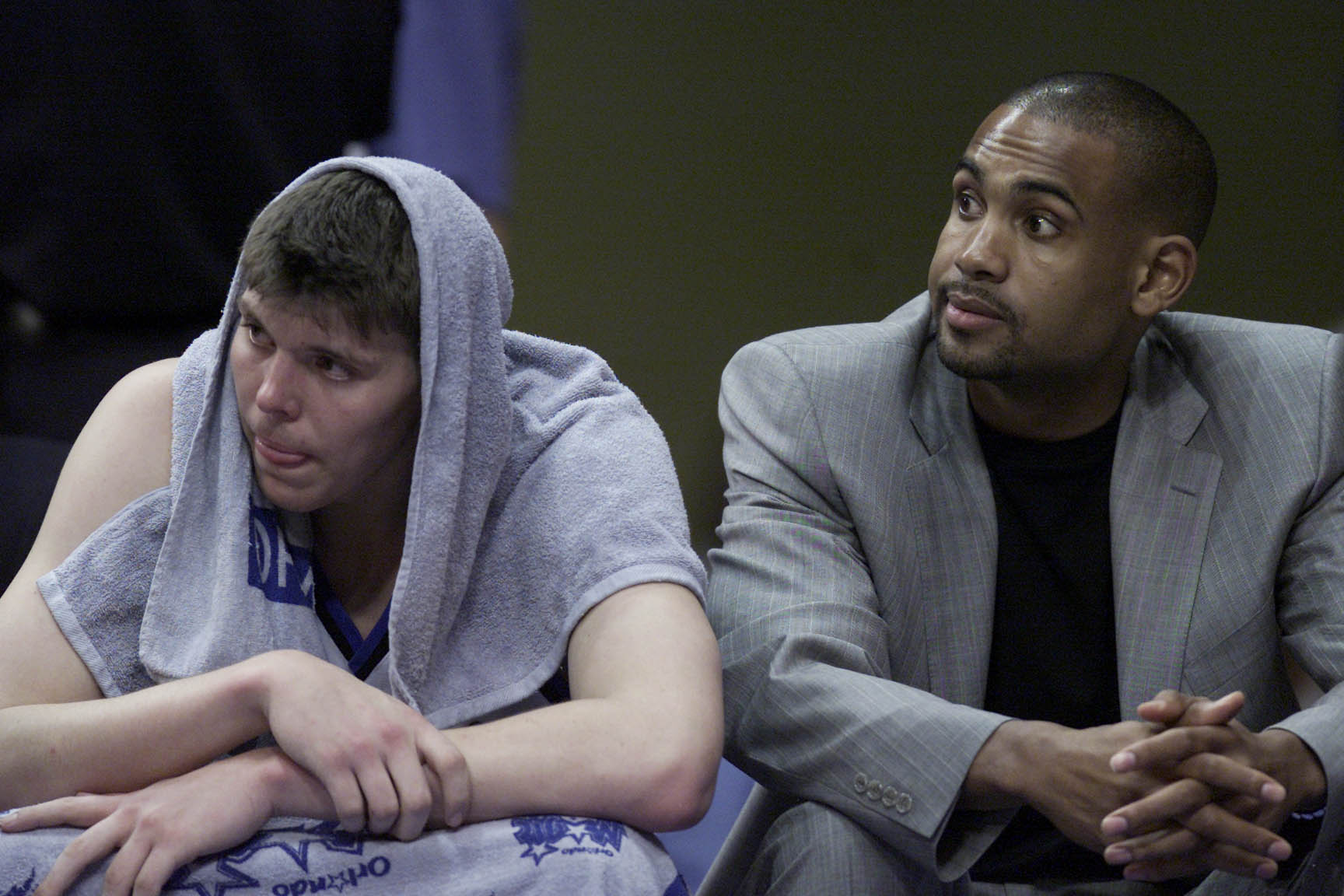 1 May 2001:  Mike Miller #50 and Grant Hill of the Orlando Magic watch from the bench during game four of round one in the NBA playoffs against the Orlando Magic at the TD Waterhouse in Orlando, Florida.  The Bucks won 112-104 to take the series 3-1.  DIG
