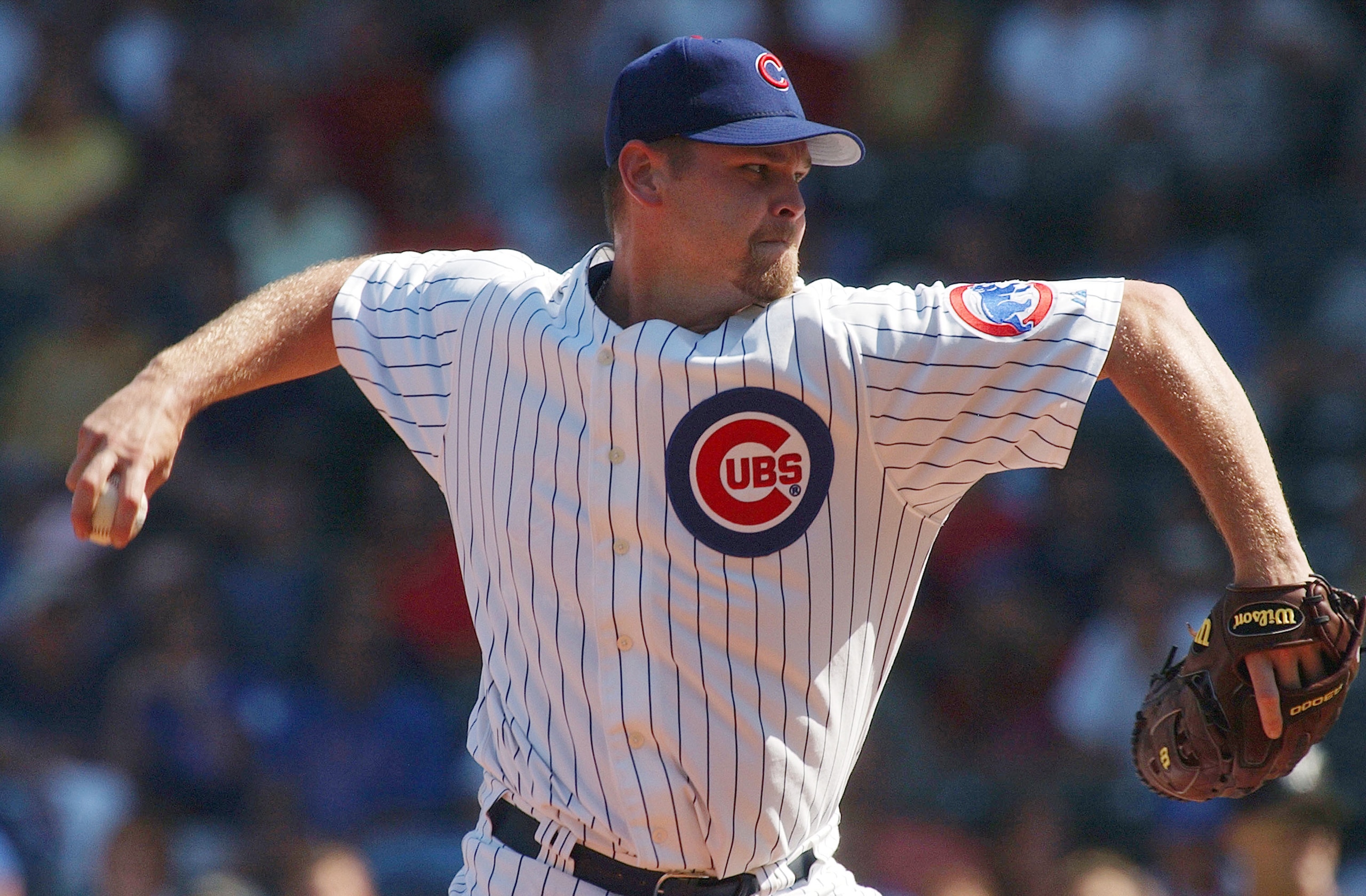 CHICAGO - SEPTEMBER 10: Kerry Wood #34 of the Chicago Cubs pitches against the Florida Marlins during game one of a doubleheader on September 10, 2004 at Wrigley Field in Chicago, Illinois. (Photo by Jonathan Daniel/Getty Images)