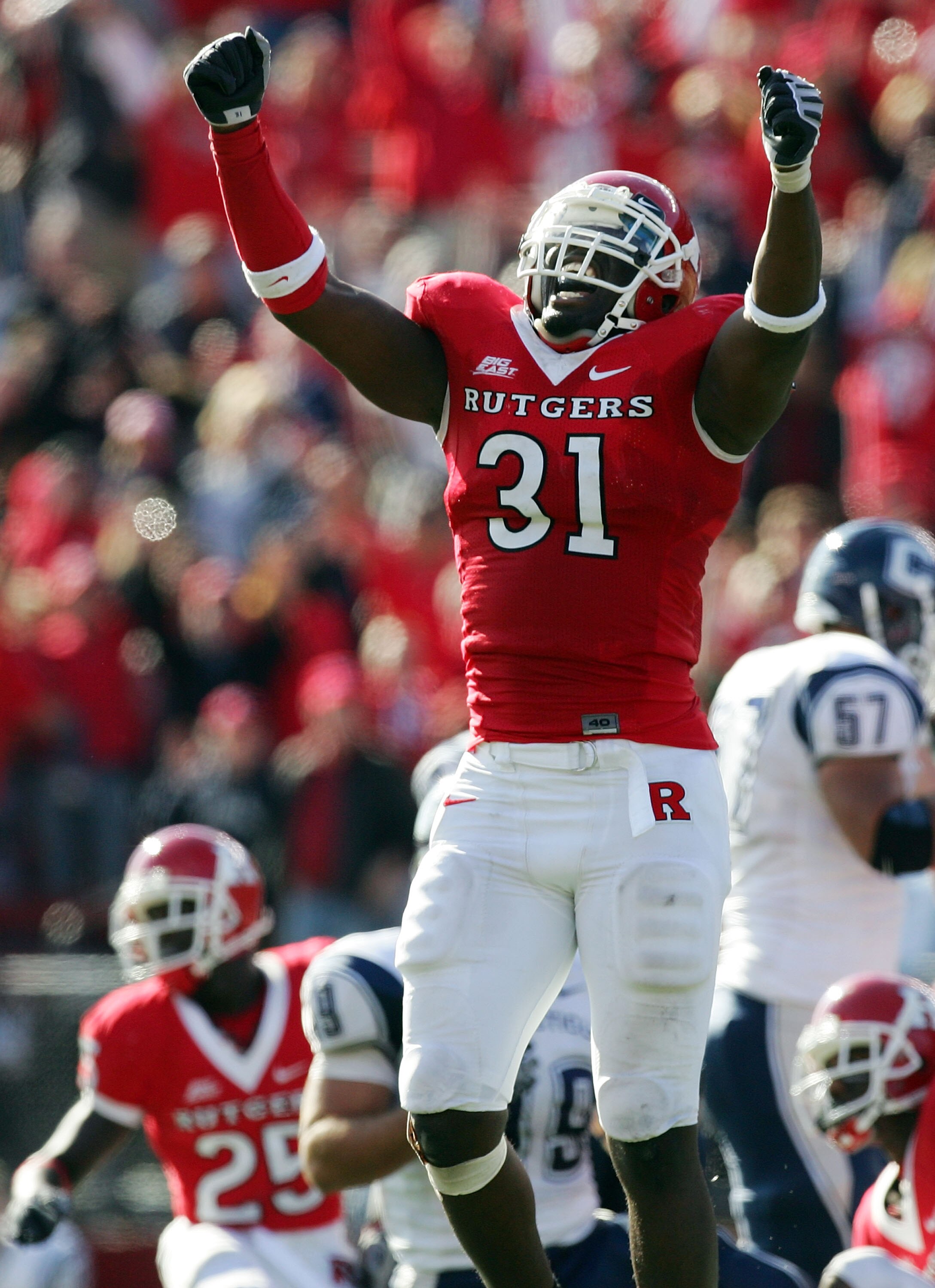 PISCATAWAY, NJ - OCTOBER 18:  George Johnson #31 of the Rutgers Scarlet Knights celebrates a missed field goal by the Connecticut Huskies late in the game at Rutgers Stadium on October 18, 2008 in Piscataway, New Jersey. Rutgers defeated Connecticut 12-10