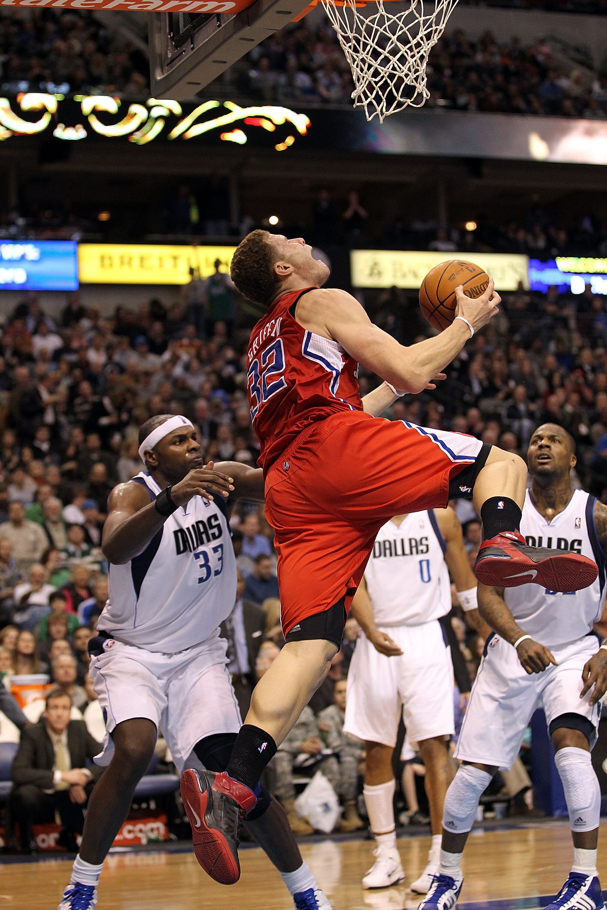 DALLAS, TX - JANUARY 25:  Forward Blake Griffin #32 of the Los Angeles Clippers takes a shot against Brendan Haywood #33 of the Dallas Mavericks at American Airlines Center on January 25, 2011 in Dallas, Texas.  NOTE TO USER: User expressly acknowledges a