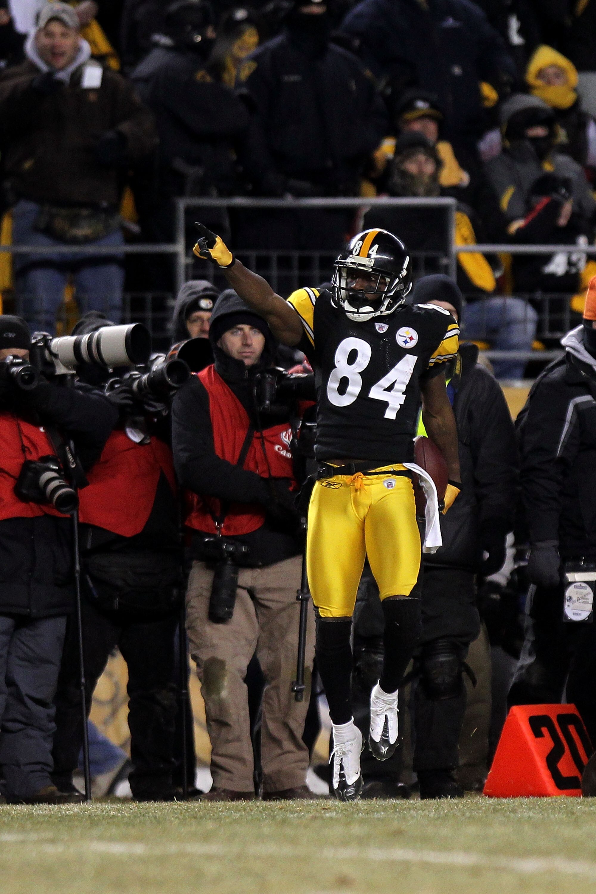 PITTSBURGH, PA - JANUARY 23:  Antonio Brown #84 of the Pittsburgh Steelers reacts after he made a first down reception in the final minute of the fourth quarter against the New York Jets during the 2011 AFC Championship game at Heinz Field on January 23,