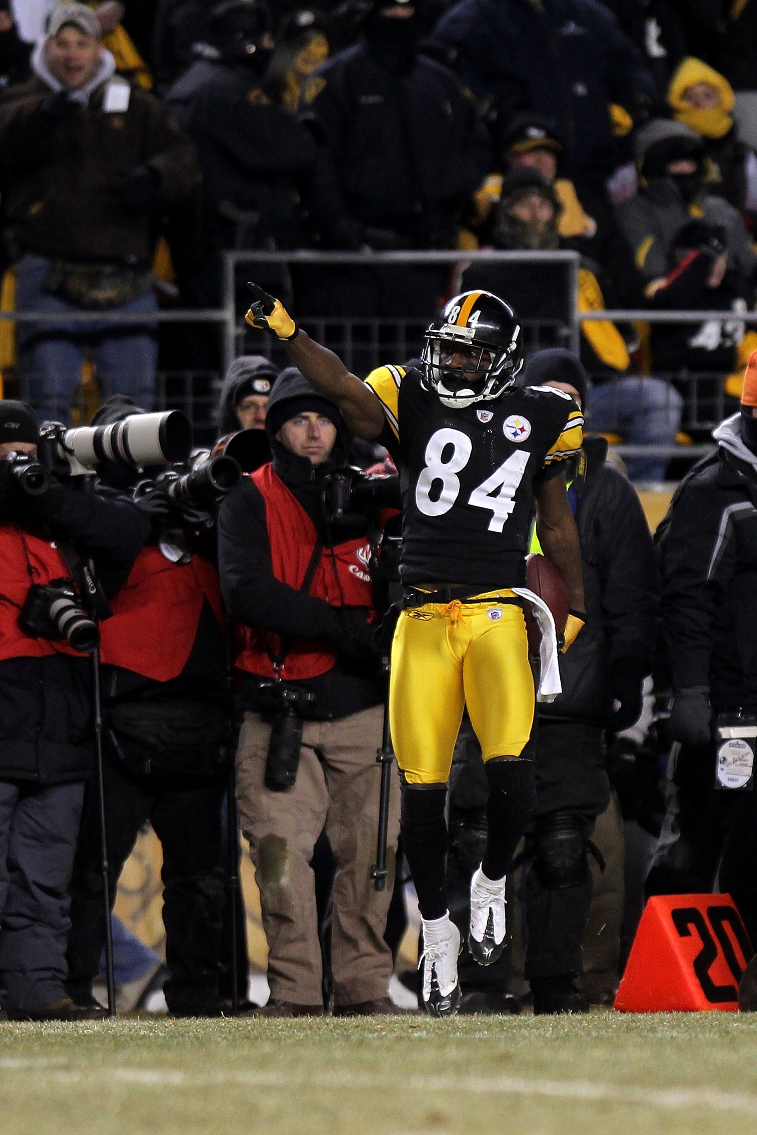 PITTSBURGH, PA - JANUARY 23:  Antonio Brown #84 of the Pittsburgh Steelers reacts after he made a first down reception in the final minute of the fourth quarter against the New York Jets during the 2011 AFC Championship game at Heinz Field on January 23,
