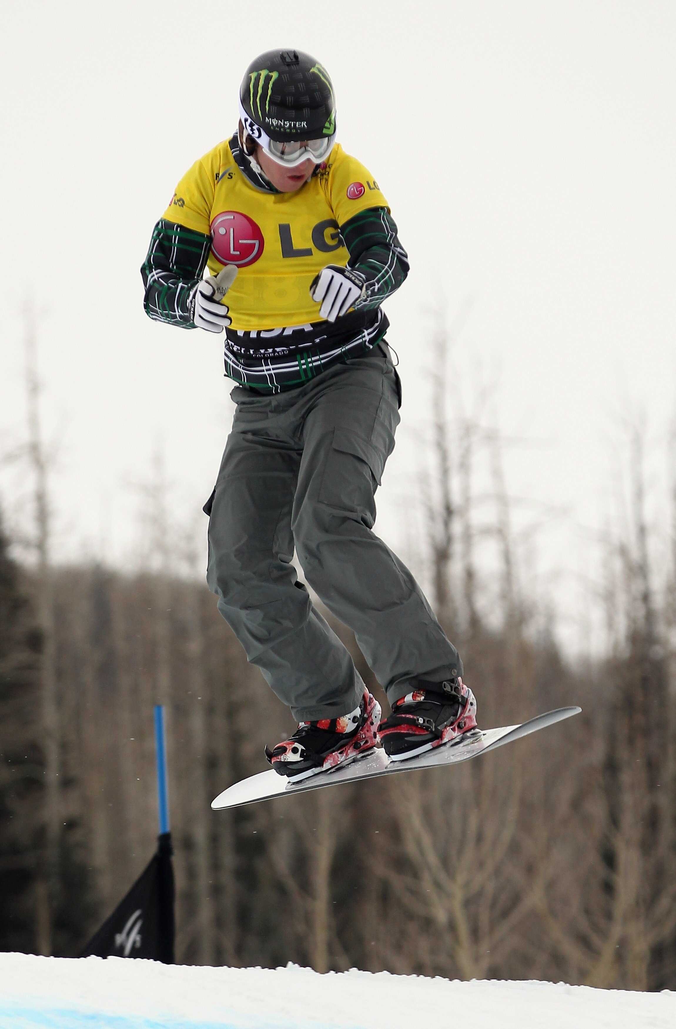 TELLURIDE, CO - DECEMBER 15:  Nate Holland of the USA descends the course as he finished fifth during Snowboard Cross Qualification at the LG Snowboard FIS World Cup on December 15, 2010 in Telluride, Colorado. Holland is currently holding the points lead