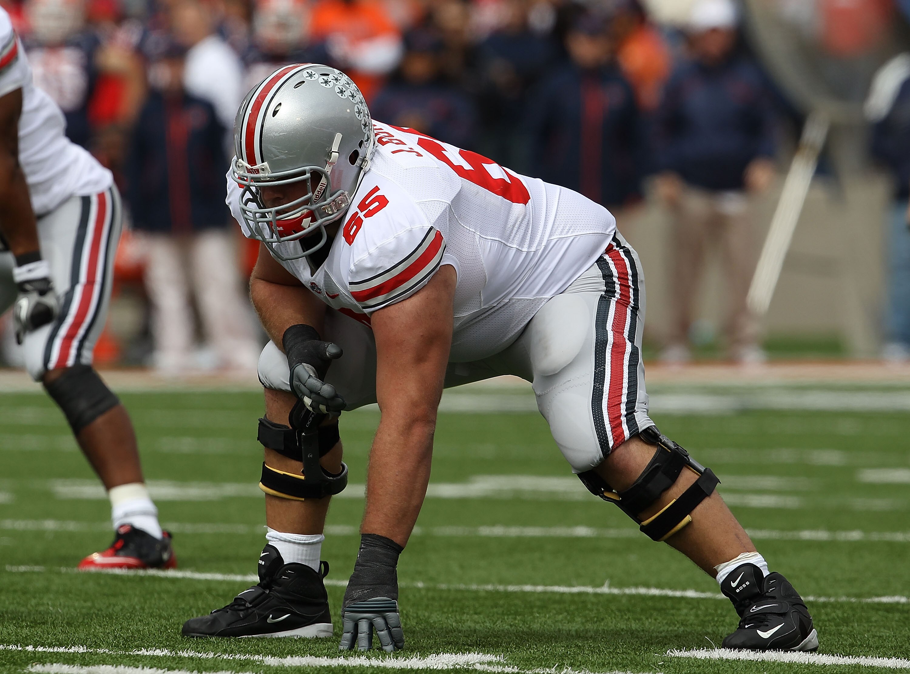 CHAMPAIGN, IL - OCTOBER 02: Justin Boren #65 of the Ohio State Buckeyes awaits the start of play against the Illinois Fighting Illini at Memorial Stadium on October 2, 2010 in Champaign, Illinois. Ohio State defeated Illinois 24-13. (Photo by Jonathan Dan