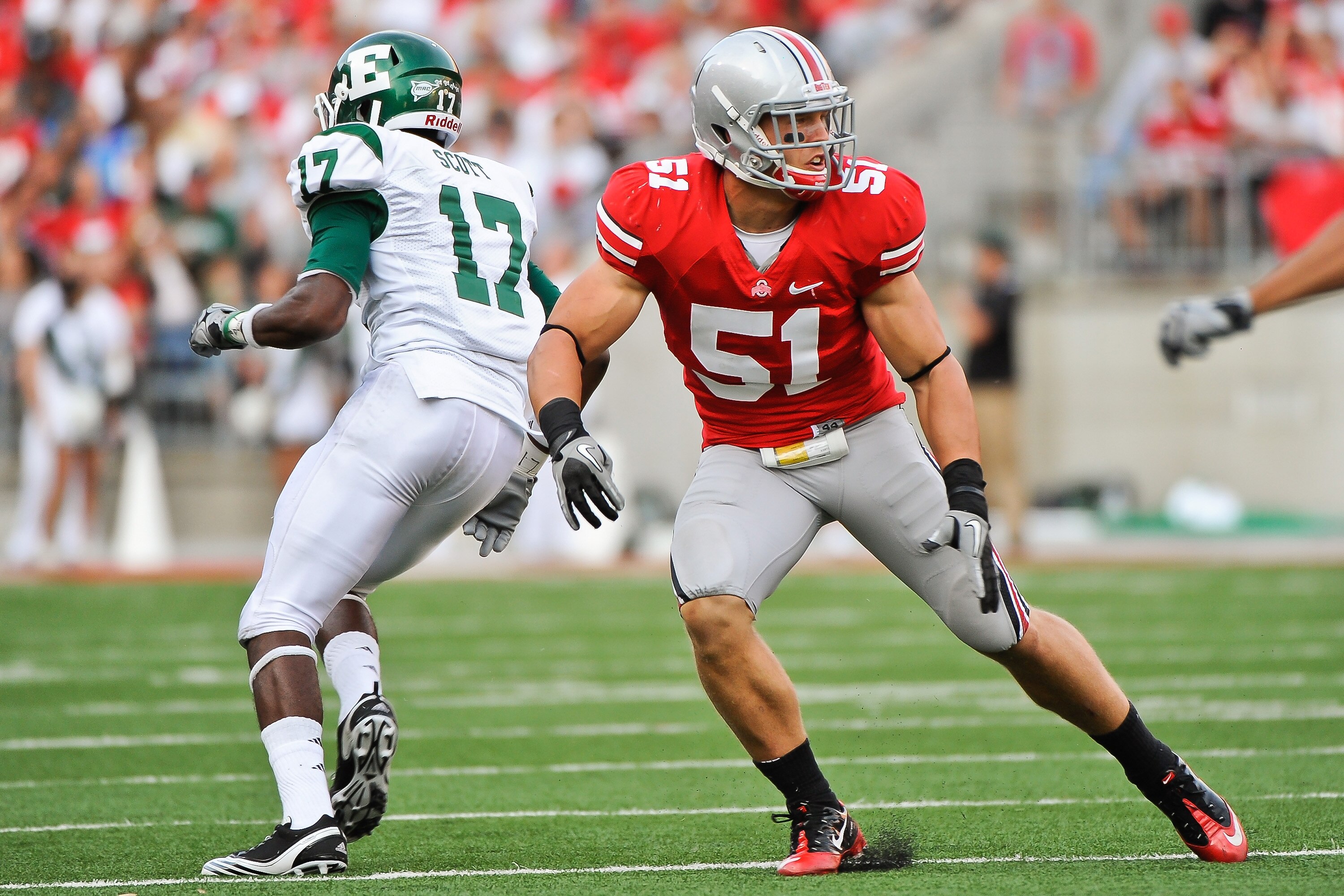 COLUMBUS, OH - SEPTEMBER 25:  Ross Homan #51 of the Ohio State Buckeyes defends against the Eastern Michigan Eagles at Ohio Stadium on September 25, 2010 in Columbus, Ohio.  Ohio State won 73-20. (Photo by Jamie Sabau/Getty Images)