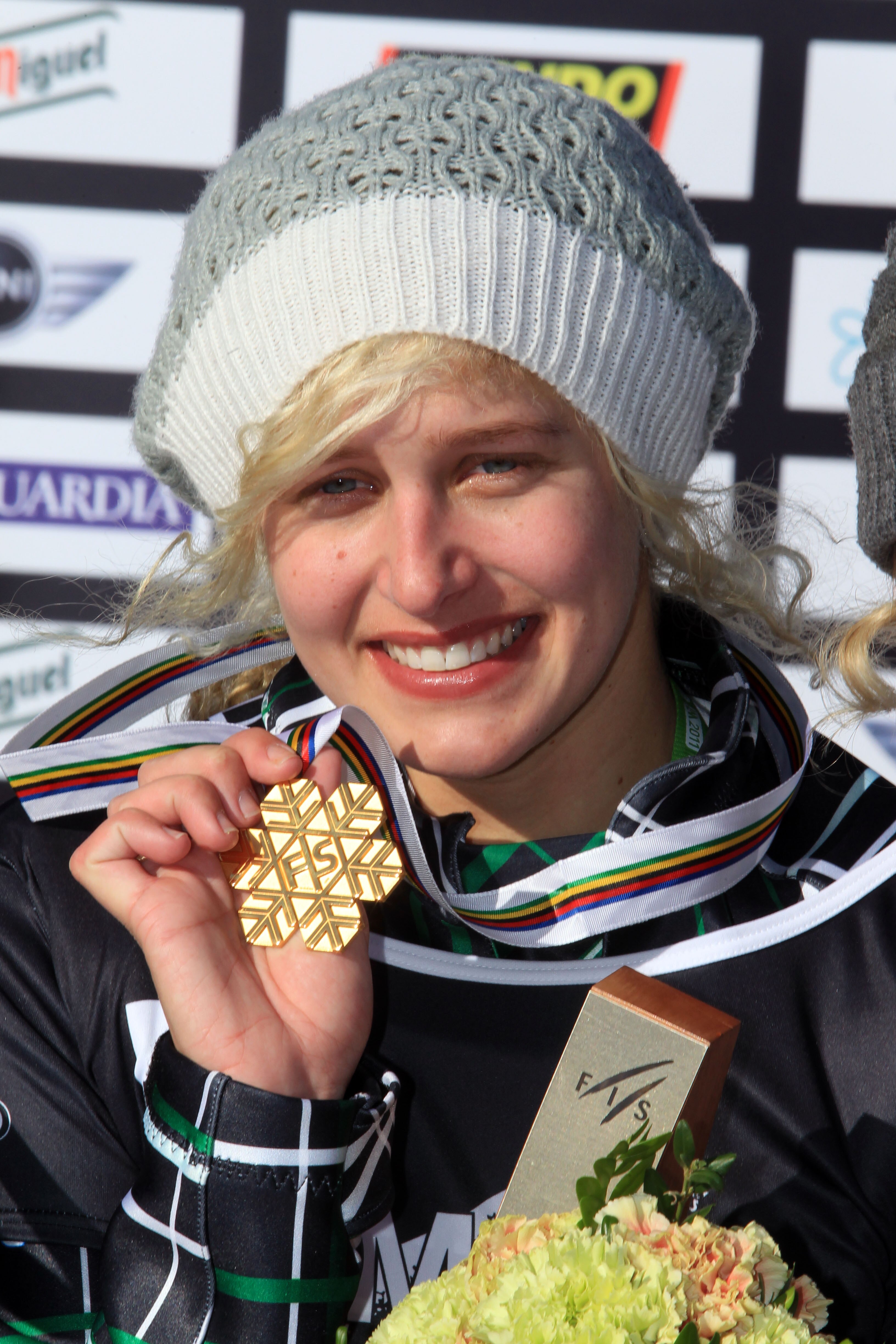 LA MOLINA, SPAIN - JANUARY 18: (FRANCE OUT) Lindsey Jacobellis of the USA takes 1st place during the FIS Snowboard World Championships Men's and Women's Snowboardcross on January 18, 2011 in La Molina, Spain.  (Photo by Christophe Pallot/Agence Zoom/Getty