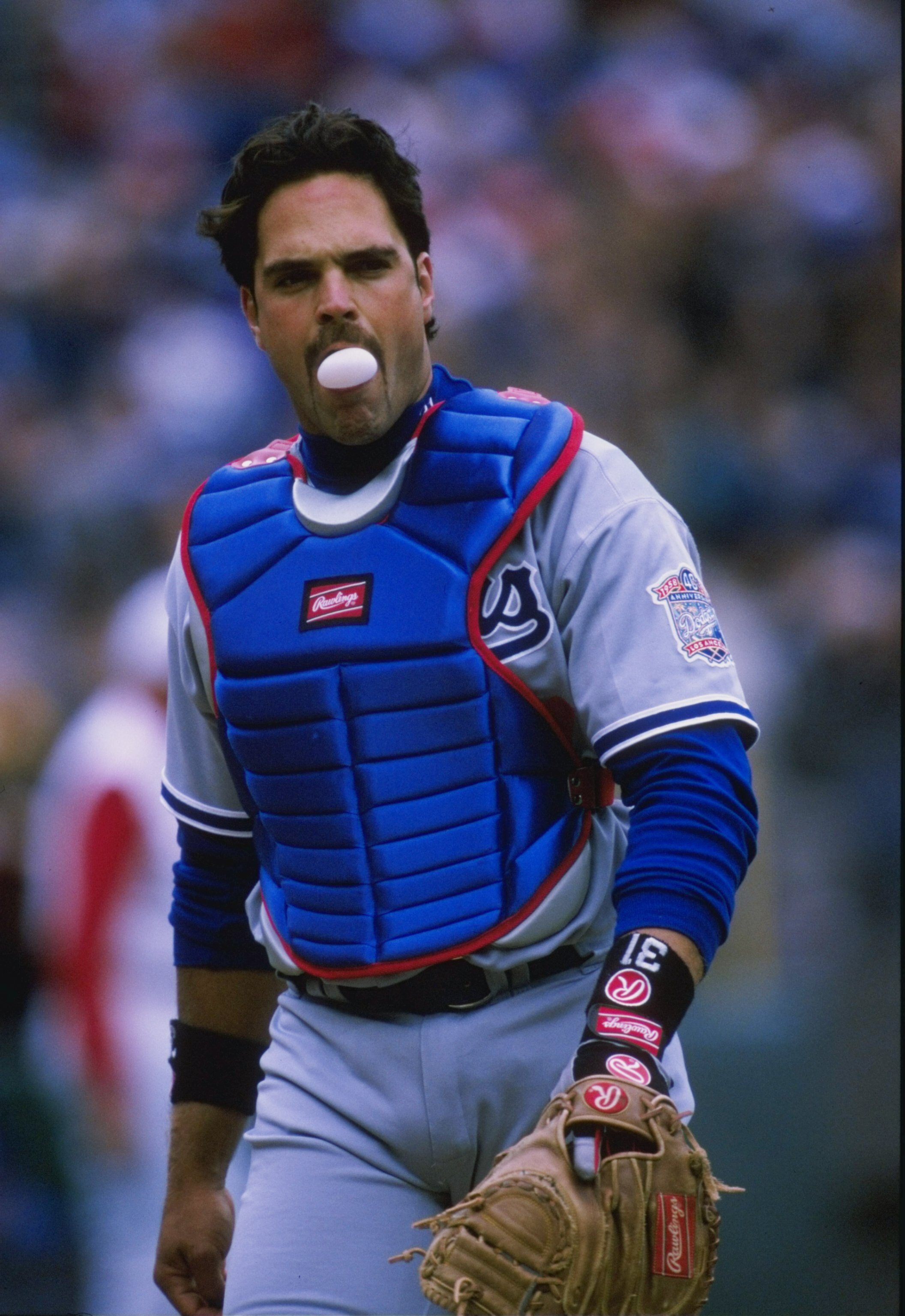 4 Apr 1998:  Catcher Mike Piazza of the Los Angeles Dodgers in action during a game against the Cincinnati Reds at Cynergy Field in Cincinnati, Ohio. The Reds defeated the Dodgers 3-1. Mandatory Credit: Vincent Laforet  /Allsport