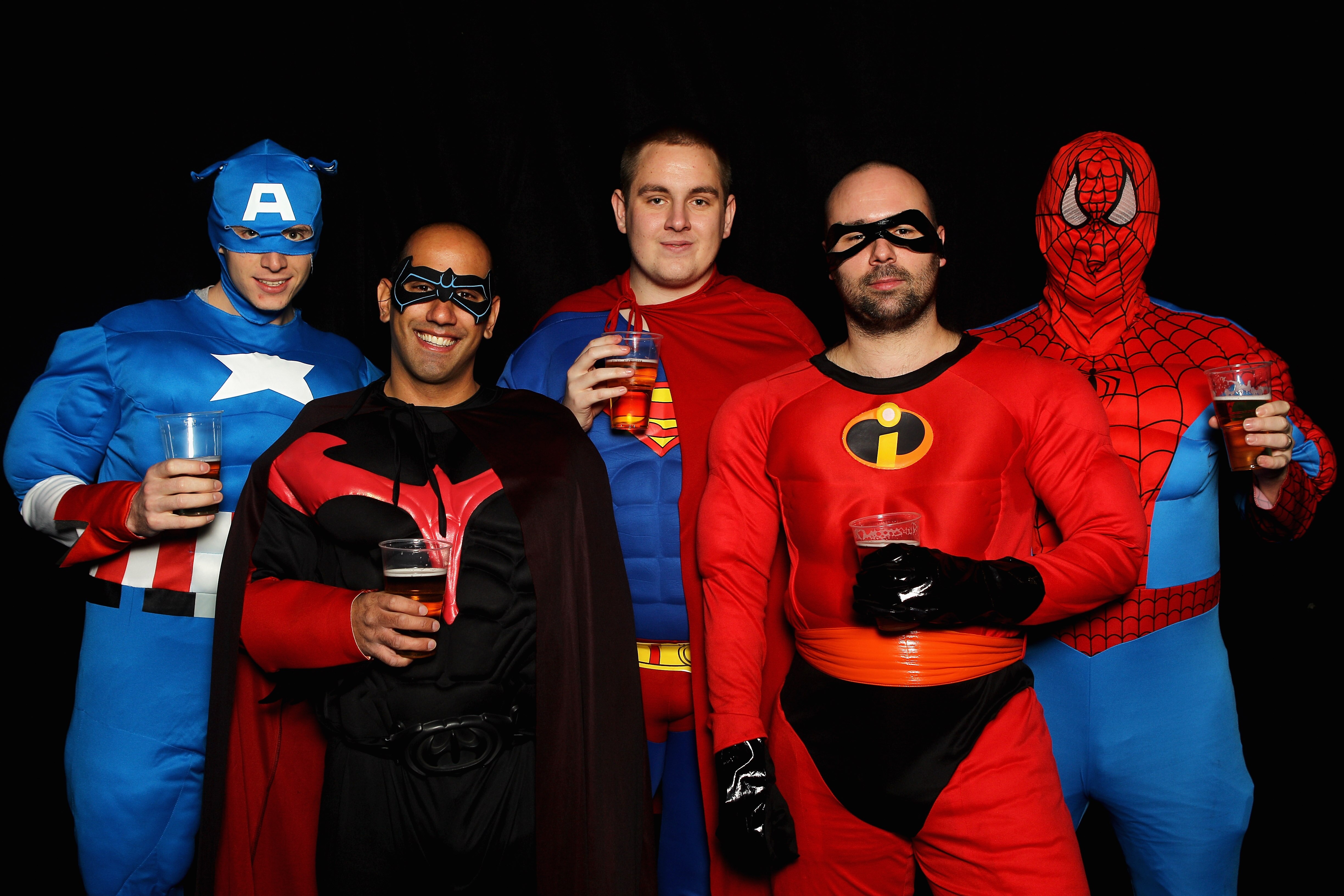 LONDON, ENGLAND - JANUARY 03:  Darts fans dressed as Captain America, Batman, Superman, Mr. Incredible and Spider-Man pose prior to the Final of the 2011 Ladbrokes.com World Darts Championship at Alexandra Palace on January 3, 2011 in London, England.  (P