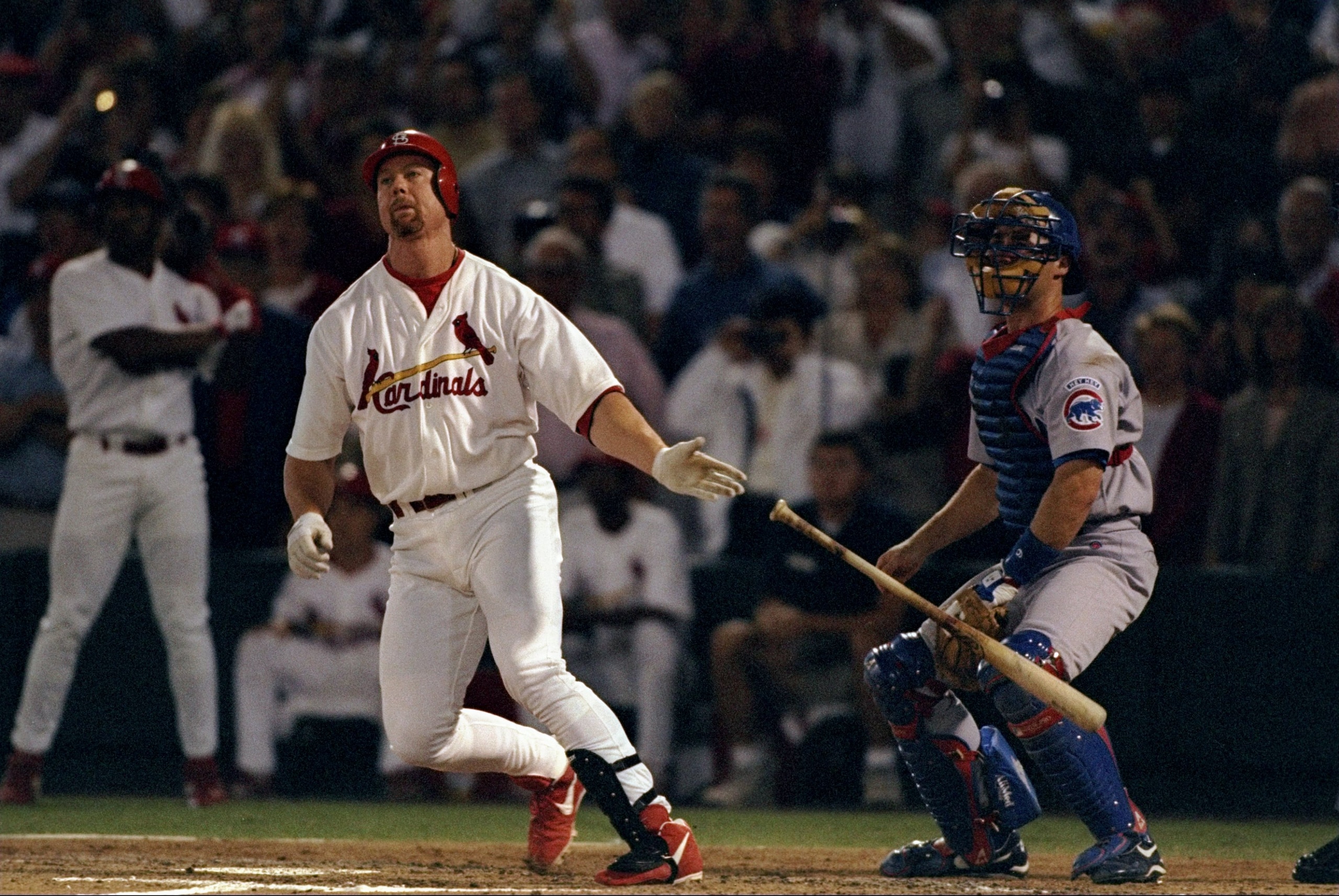 8 Sep 1998: Mark McGwire #25 of the St. Louis Cardinals hits his 62nd home run during the game against the Chicago Cubs at the Busch Stadium in St. Louis, Missouri. The Cardinals defeated the Cubs 6-3.