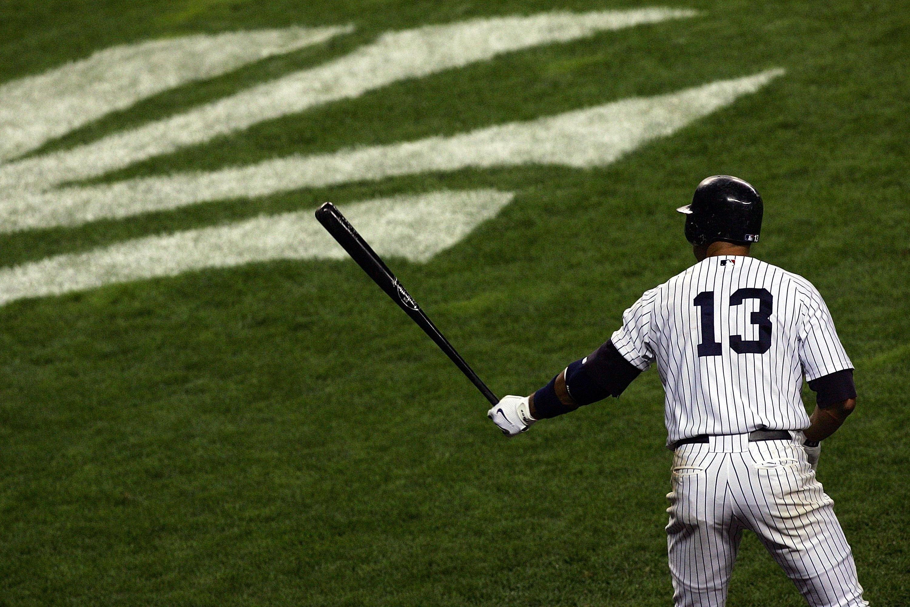 NEW YORK - OCTOBER 08:  Alex Rodriguez #13 of the New York Yankees stands on deck against the Cleveland Indians during Game Four of the American League Division Series at Yankee Stadium on October 8, 2007 in the Bronx borough of New York City.  (Photo by