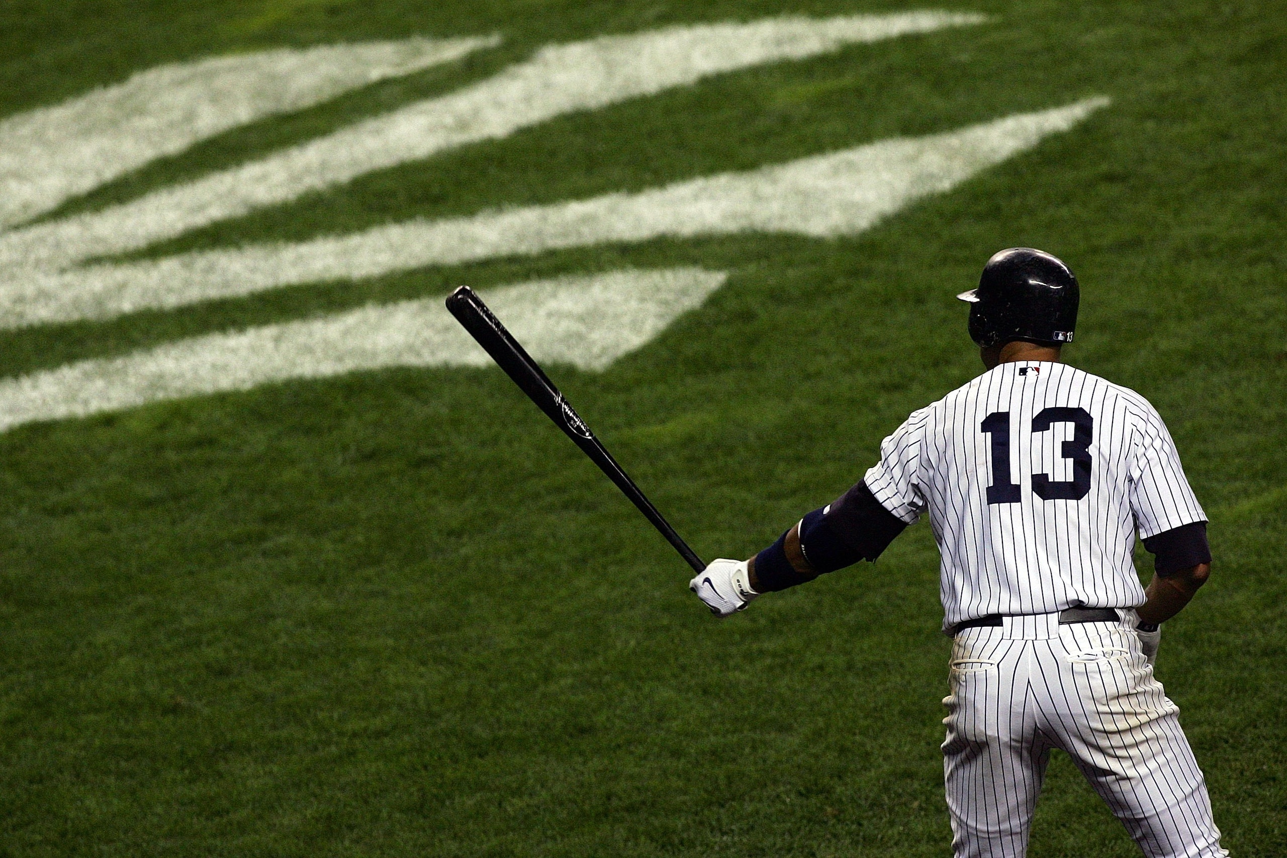 NEW YORK - OCTOBER 08:  Alex Rodriguez #13 of the New York Yankees stands on deck against the Cleveland Indians during Game Four of the American League Division Series at Yankee Stadium on October 8, 2007 in the Bronx borough of New York City.  (Photo by