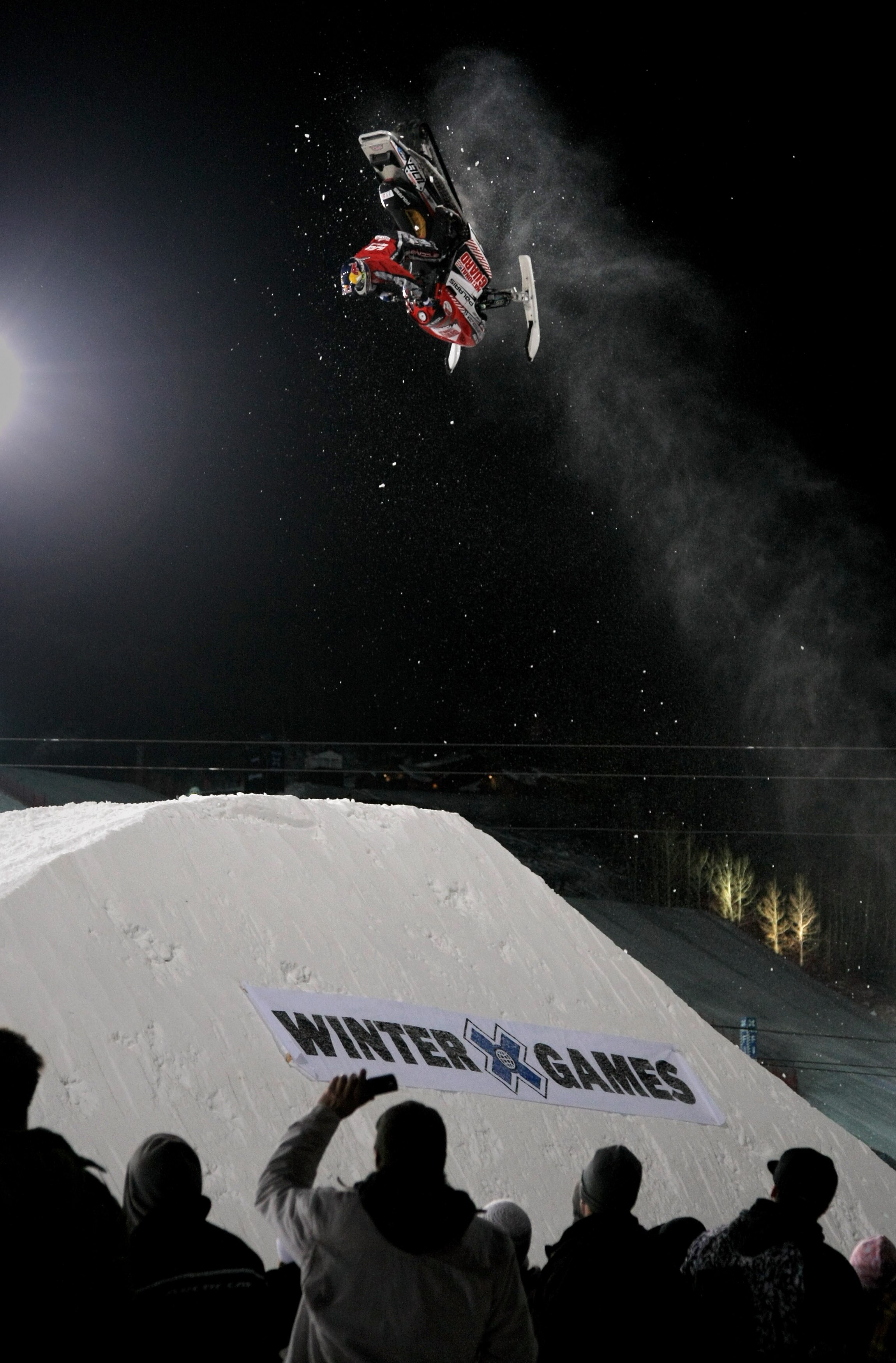ASPEN, CO - JANUARY 22:  Levi LaVallee of Longville, Minnesota does a backflip in the semifinals enroute to a second place finish in the Snowmobile Speed and Style at Winter X Games 13 on Buttermilk Mountain on January 22, 2009 in Aspen, Colorado.  (Photo