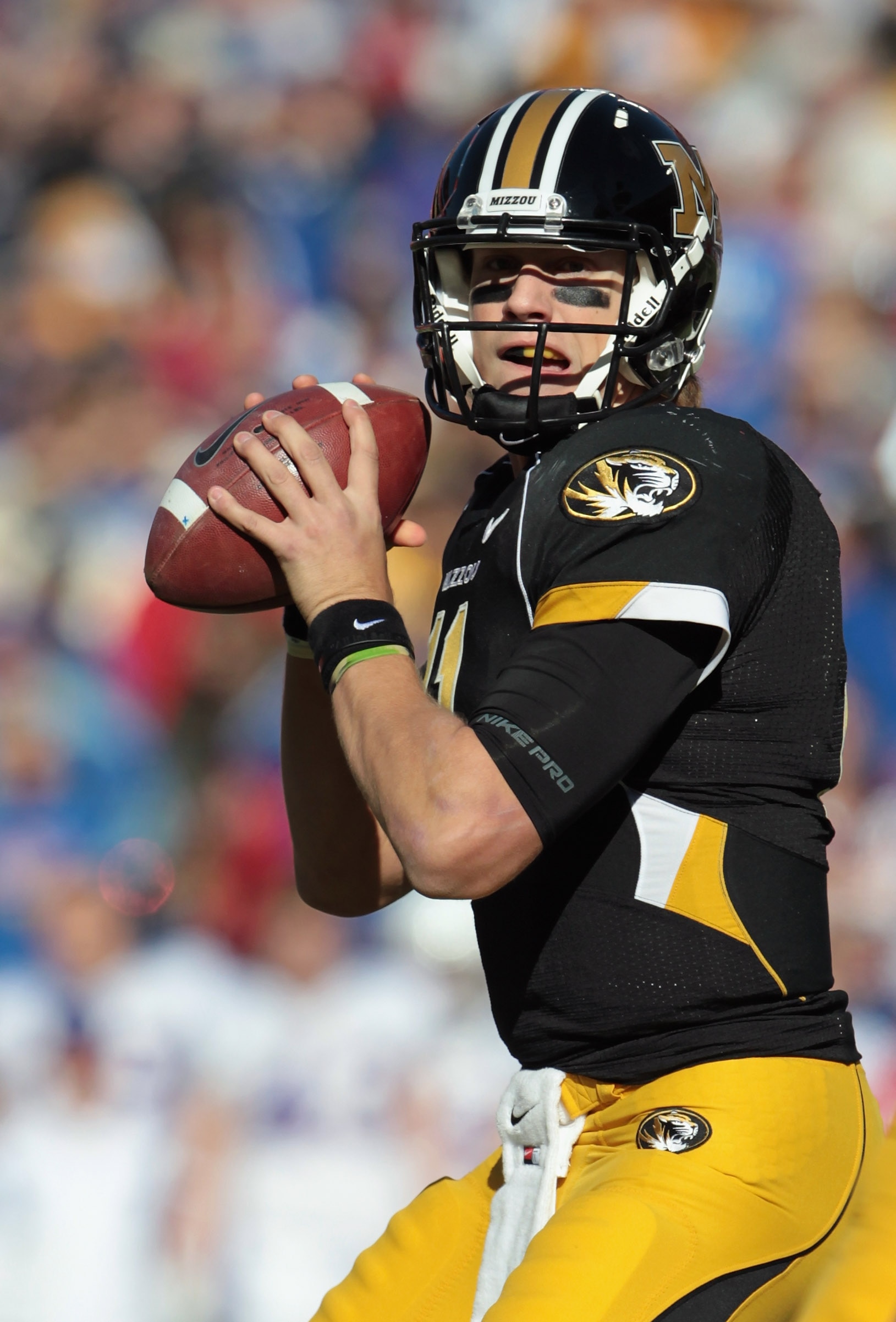KANSAS CITY, MO - NOVEMBER 27:  Quarterback Blaine Gabbert #11 of the Missouri Tigers passes during the game against the Kansas Jayhawks on November 27, 2010 at Arrowhead Stadium in Kansas City, Missouri.  (Photo by Jamie Squire/Getty Images)