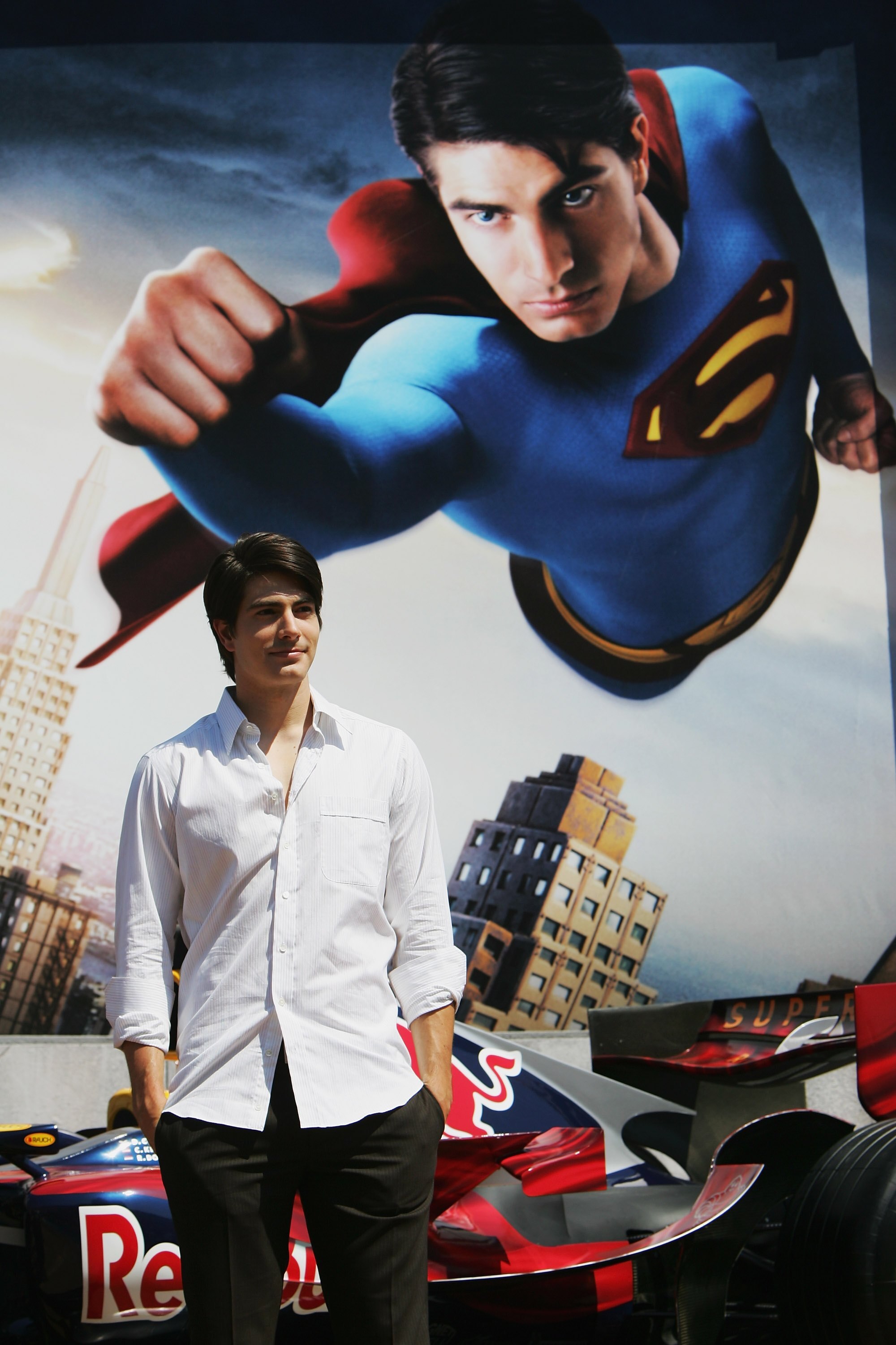 MONTE CARLO, MONACO - MAY 28:  Superman Returns actor Brandon Routh poses in front of the Red Bull Racing F1 car prior to the Monaco Formula One Grand Prix at the Monte Carlo Circuit on May 28, 2006, in Monte Carlo, Monaco.  (Photo by Bryn Lennon/Getty Im