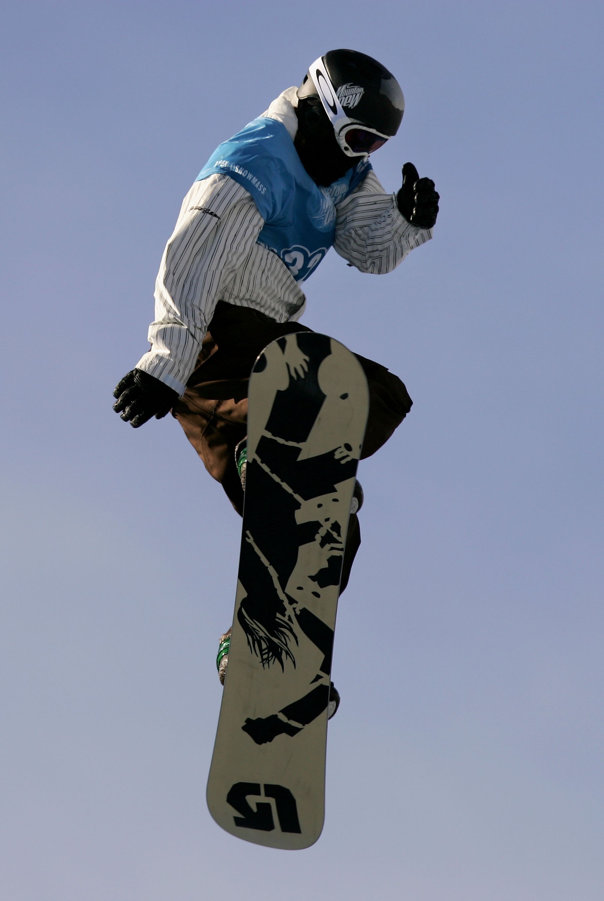 ASPEN, CO - JANUARY 28:  Shaun White of Carlsbad, California takes his first run enroute to winning the gold medal in the Men's Snowboard Slopestyle at Winter X Games 10 on January 28, 2006 at Buttermilk Mountain in Aspen, Colorado.  (Photo by Doug Pensin