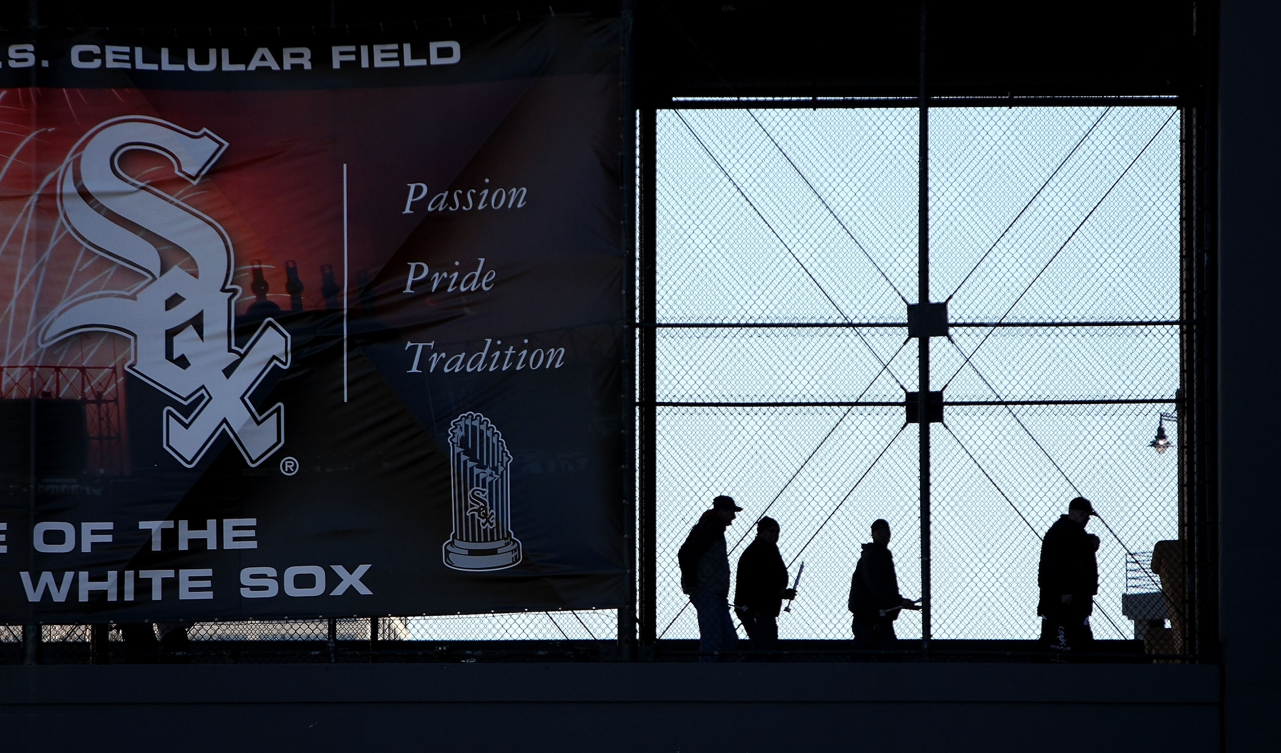 CHICAGO - APRIL 7: Fans walk across a bridge into U.S. Cellular Field before the Opening Day game between the Chicago White Sox and the Kansas City Royals on April 7, 2009 in Chicago, Illinois. (Photo by Jonathan Daniel/Getty Images)