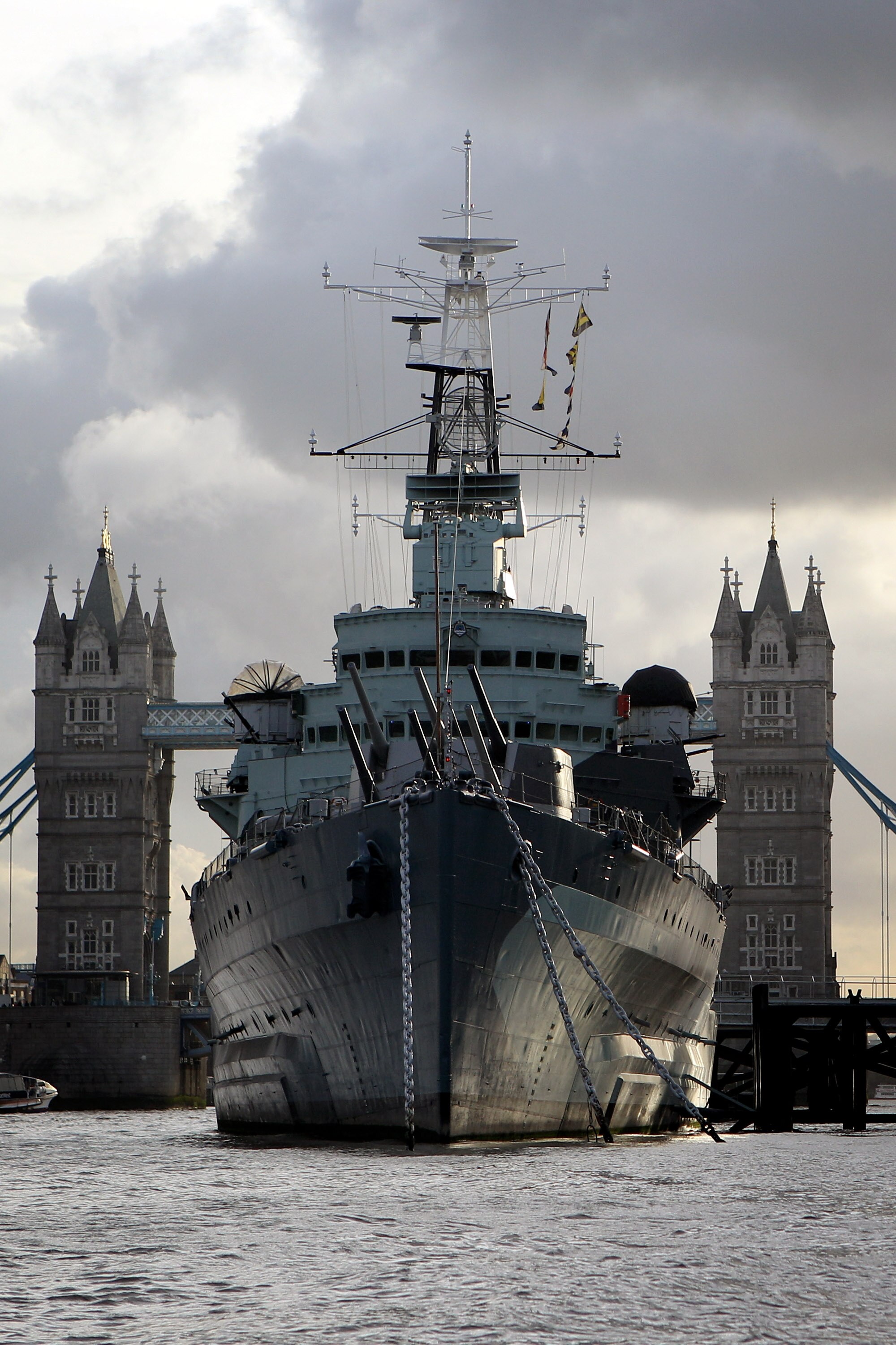 LONDON, ENGLAND - NOVEMBER 03: HMS Belfast, a decommissioned Navy warship now used as a museum, is moored in front of Tower Bridge on November 3, 2010 in London, England. With less than two years to go until the Olympic Games the capital is preparing for