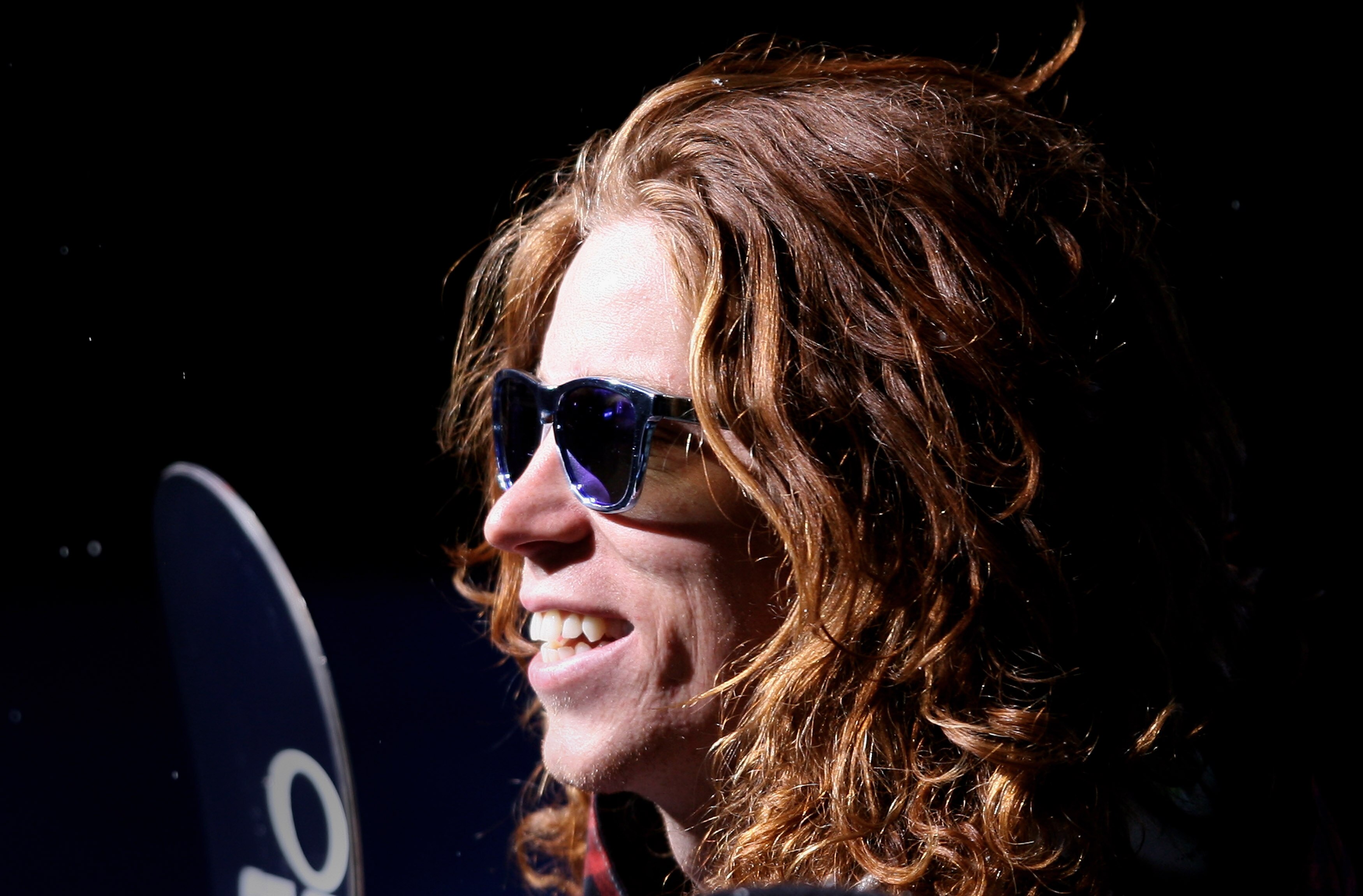 ASPEN, CO - JANUARY 25:  Shaun White of Carlsbad, California takes the podium to receive the gold medal in the Men's Snowboard Superpipe Final at Winter X Games 13 on Buttermilk Mountain on January 25, 2009 in Aspen, Colorado. White became the first to ea