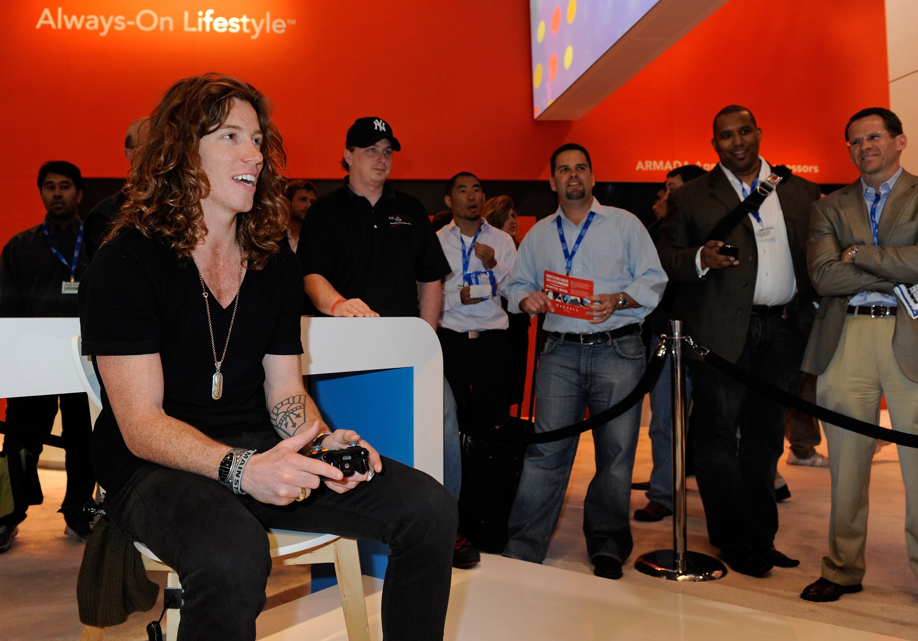 LAS VEGAS - MARCH 24:  Olympic gold medalist snowboarder Shaun White plays the 'Shaun White Snowboarding' video game on an Xbox at the Marvell booth at the International CTIA Wireless 2010 convention at the Las Vegas Convention Center March 24, 2010 in La