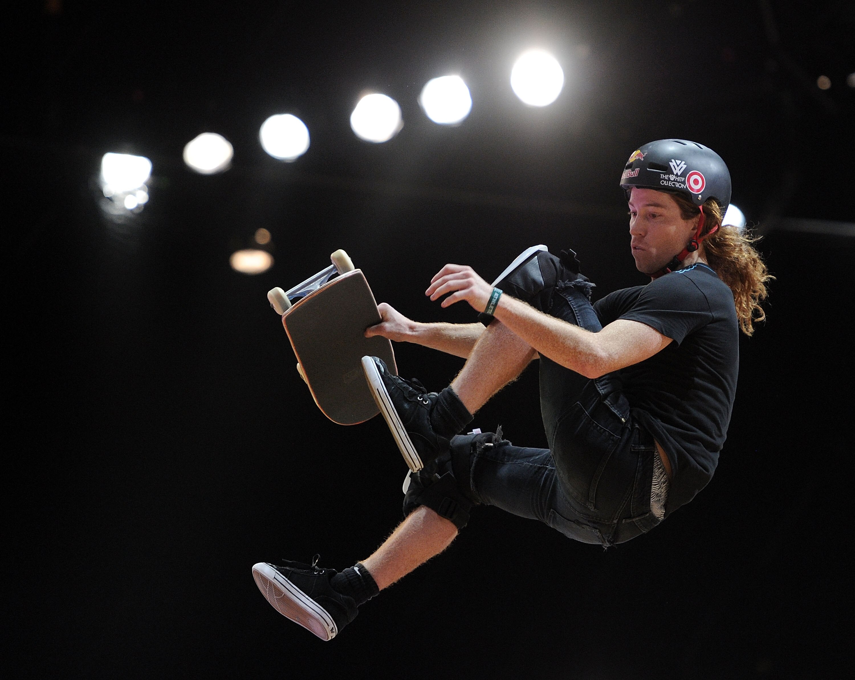 LOS ANGELES, CA - JULY 30:  Shaun White competes to a silver medal in the Skateboard Vert Final during X Games 16 at the Nokia Theatre LA Live on July 30, 2010 in Los Angeles, California.  (Photo by Harry How/Getty Images)
