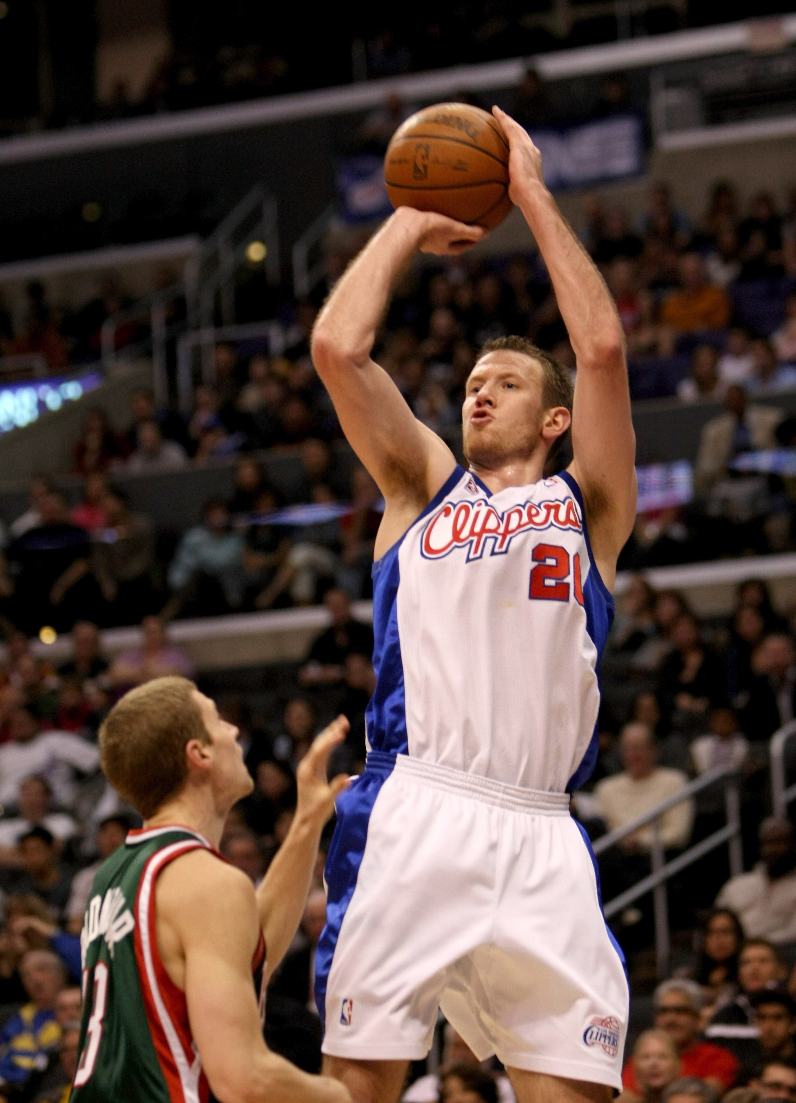 LOS ANGELES, CA - JANUARY 17: Steve Novak #21 of the Los Angeles Clippers shoots over Luke Ridnour #13 of the Milwaukee Bucks on January 17, 2009 at Staples Center in Los Angeles, California.  The Clippers won 101-92.  NOTE TO USER: User expressly acknowl