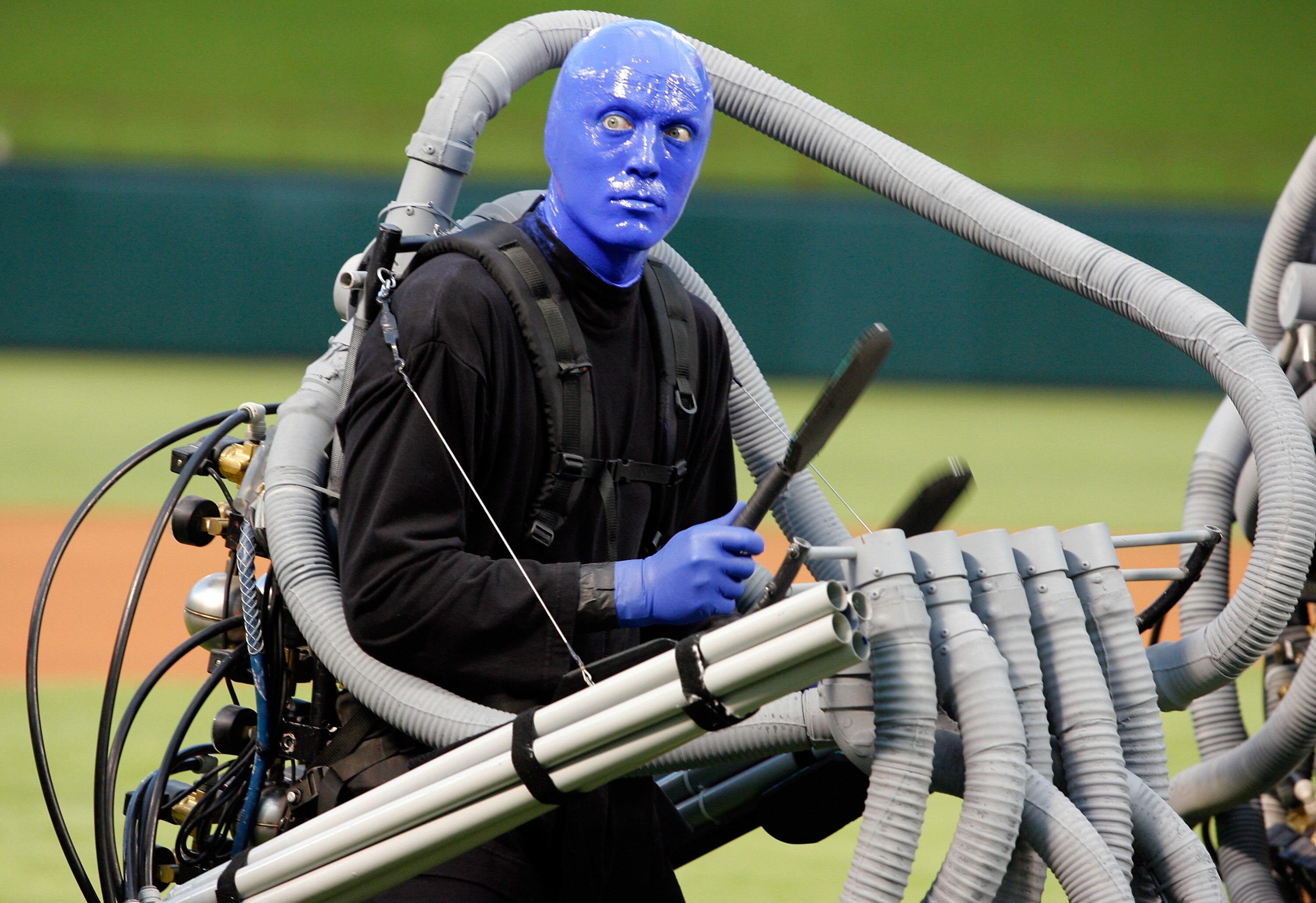 ARLINGTON, TX - SEPTEMBER 10:  A member of Blue Man Group performs the National Anthem before the New York Yankees take on the Texas Rangers on September 10, 2010 at Rangers Ballpark in Arlington, Texas.  (Photo by Tom Pennington/Getty Images)