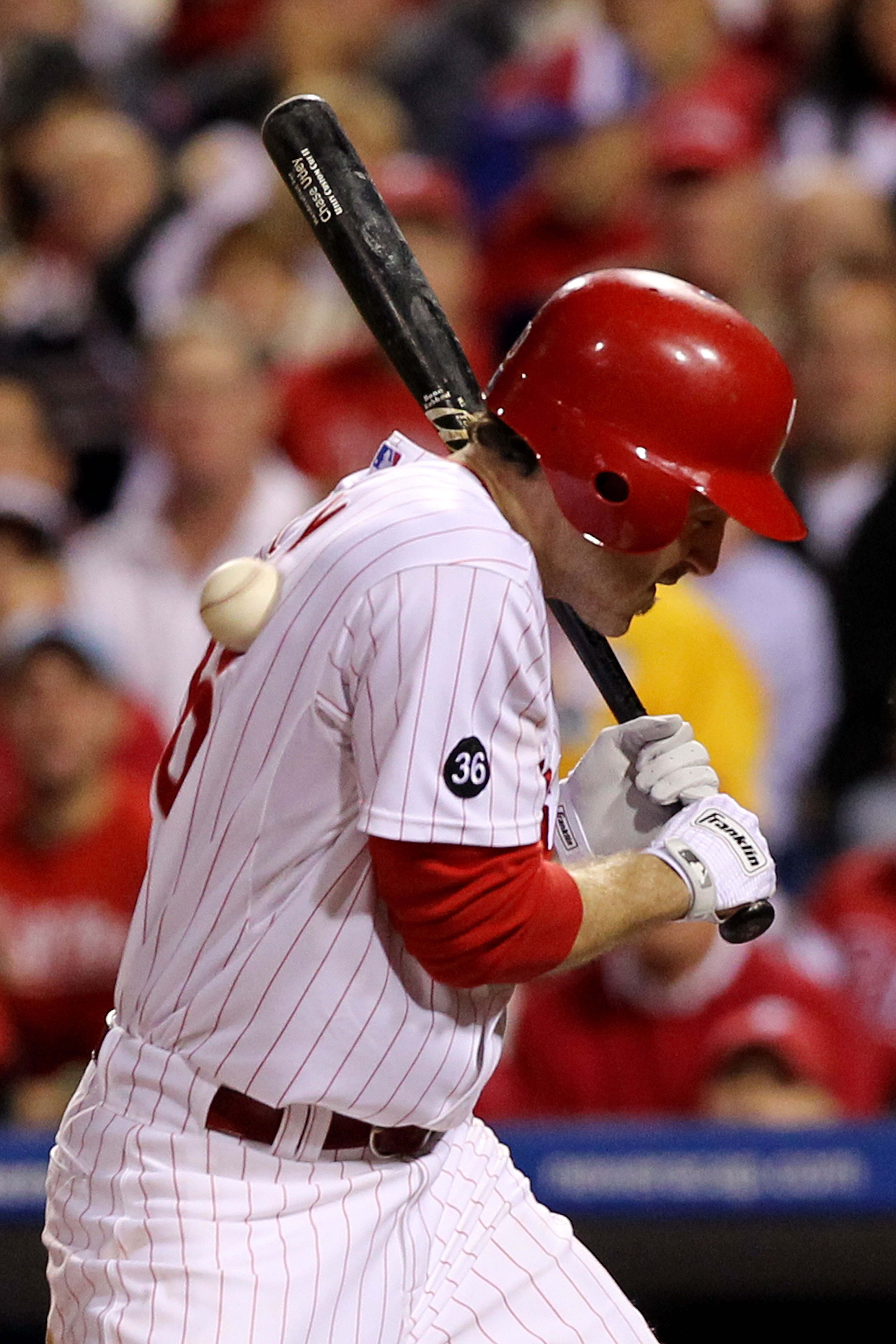 PHILADELPHIA - OCTOBER 23:  Chase Utley #26 of the Philadelphia Phillies is hit by a pitch in the third inning against the San Francisco Giants in Game Six of the NLCS during the 2010 MLB Playoffs at Citizens Bank Park on October 23, 2010 in Philadelphia,