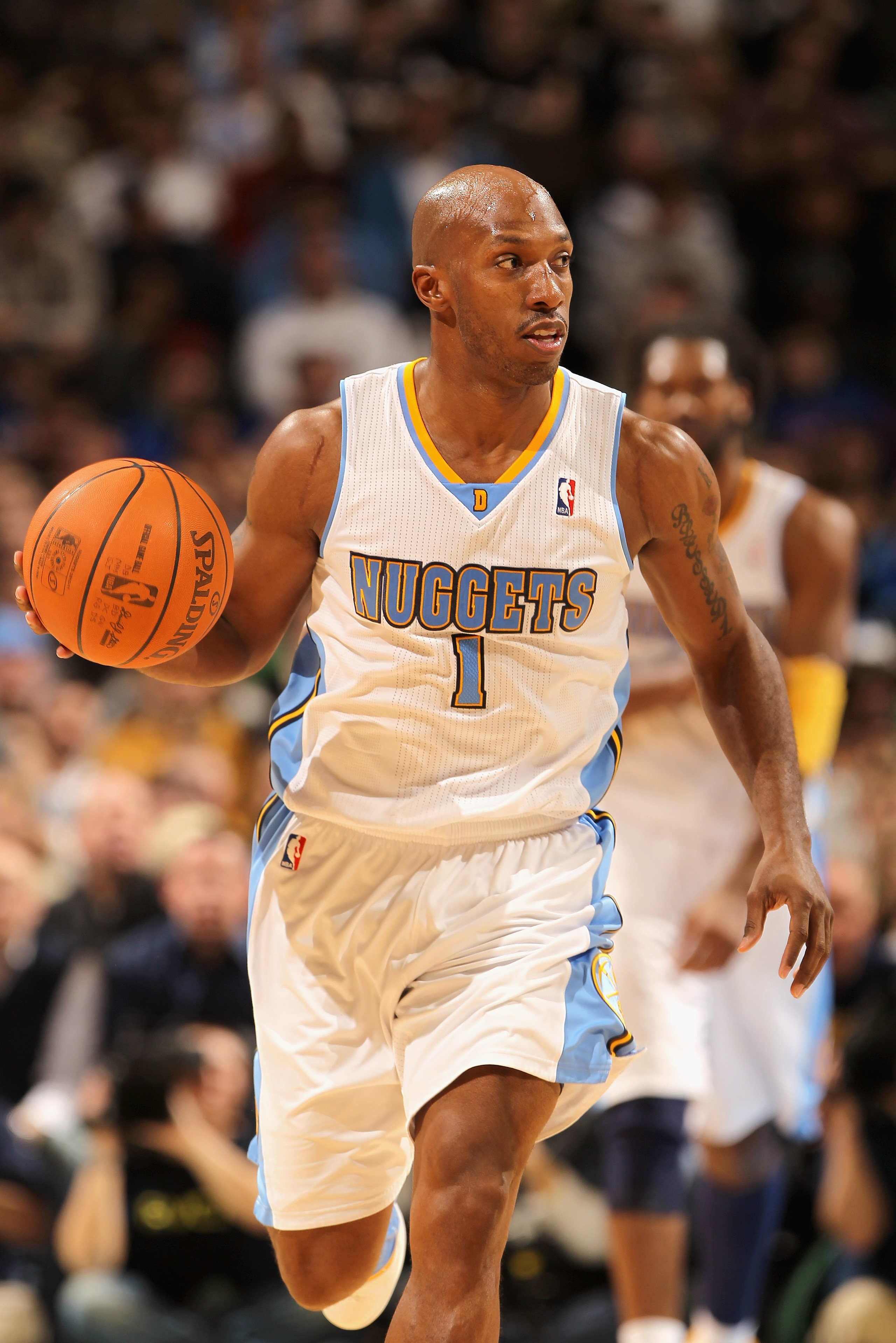 DENVER, CO - JANUARY 13: Chauncey Billups #1 of the Denver Nuggets dribbles the ball upcourt against the Miami Heat at the Pepsi Center on January 13, 2011 in Denver, Colorado. The Nuggets defeated the Heat 130-102. NOTE TO USER: User expressly acknowled DENVER, CO - JANUARY 13: Chauncey Billups #1 of the Denver Nuggets dribbles the ball upcourt against the Miami Heat at the Pepsi Center on January 13, 2011 in Denver, Colorado. The Nuggets defeated the Heat 130-102. NOTE TO USER: User expressly acknowled