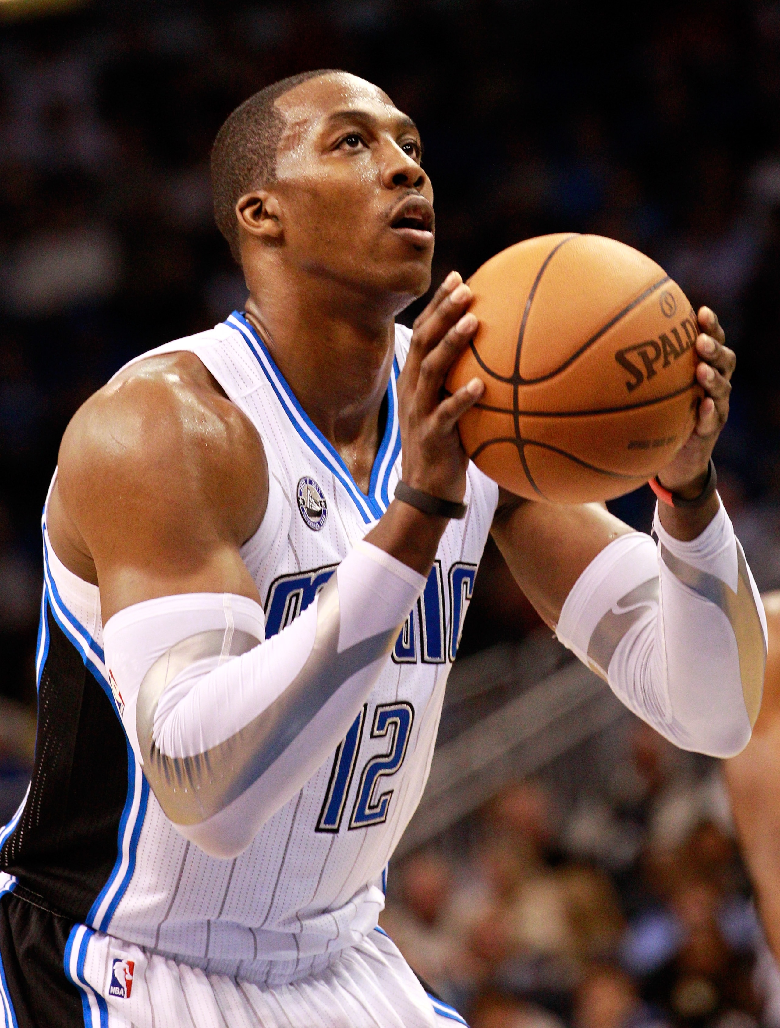 ORLANDO, FL - JANUARY 24: Dwight Howard #12 of the Orlando Magic attempts a foul shot during the game against the Detroit Pistons at Amway Arena on January 24, 2011 in Orlando, Florida. NOTE TO USER: User expressly acknowledges and agrees that, by downl ORLANDO, FL - JANUARY 24: Dwight Howard #12 of the Orlando Magic attempts a foul shot during the game against the Detroit Pistons at Amway Arena on January 24, 2011 in Orlando, Florida. NOTE TO USER: User expressly acknowledges and agrees that, by downl