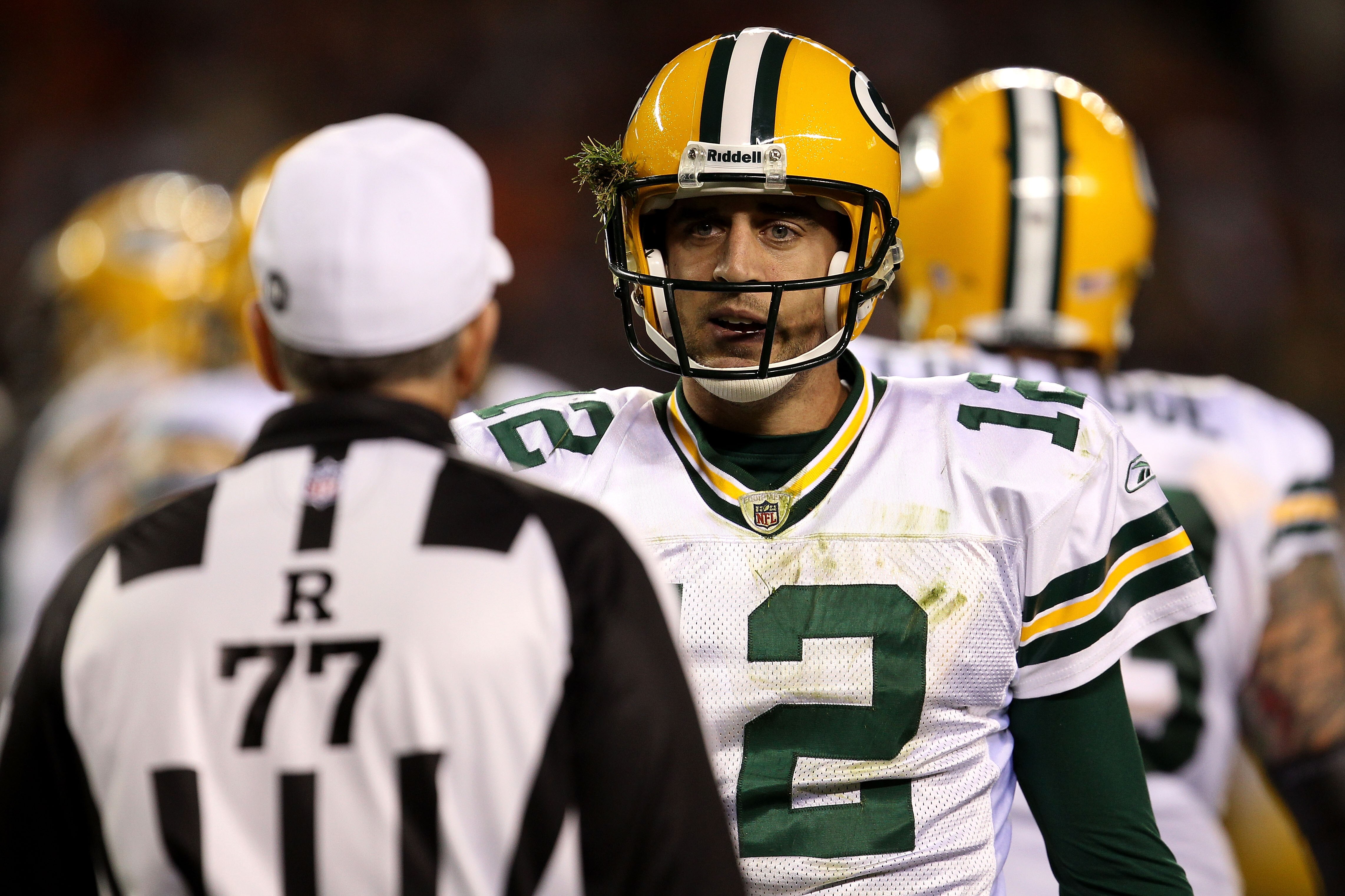 CHICAGO - SEPTEMBER 27:  Aaron Rodgers #12 of  the Green Bay Packers talks with a referee against the Chicago Bears at Soldier Field on September 27, 2010 in Chicago, Illinois.  (Photo by Jonathan Daniel/Getty Images)