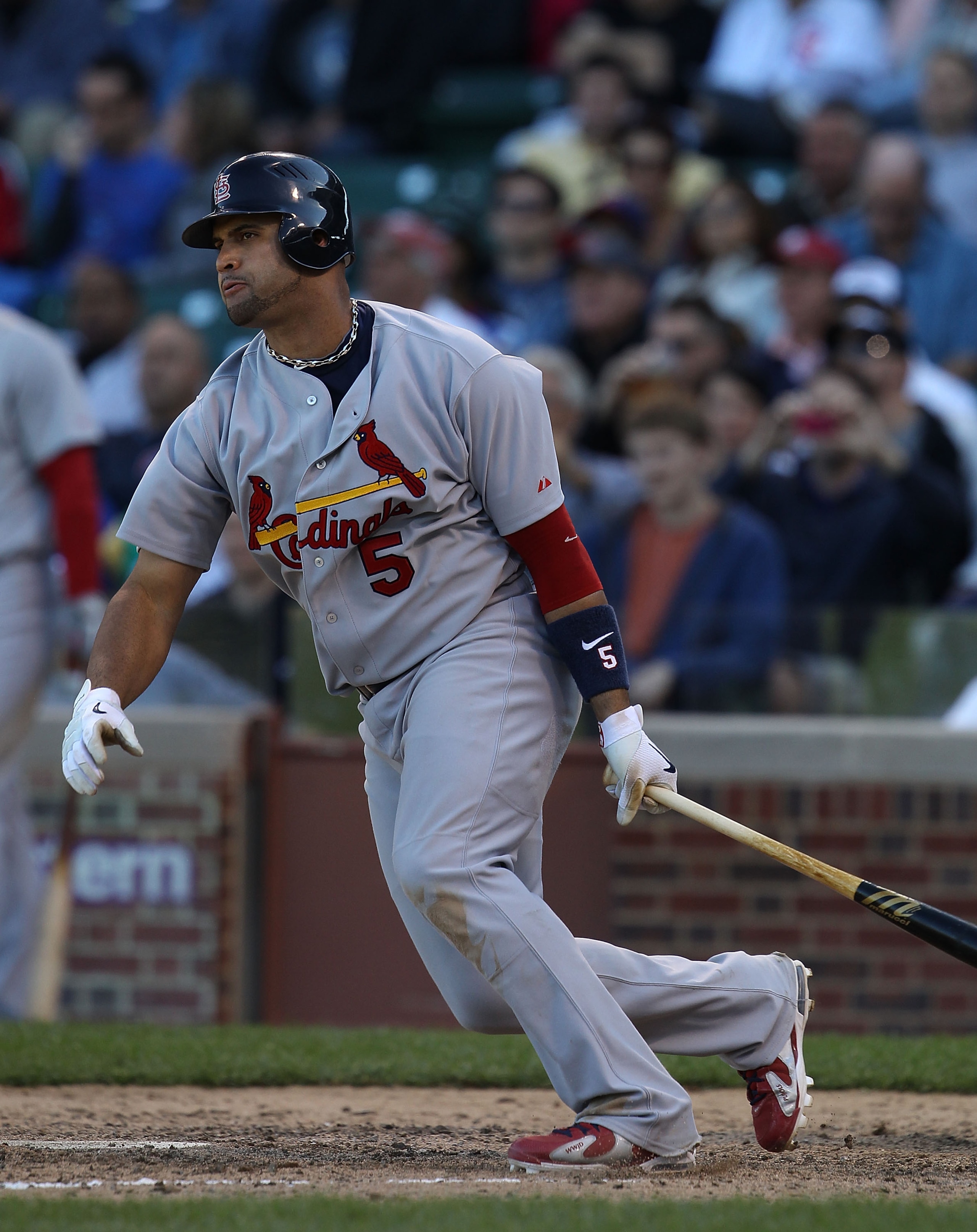 CHICAGO - SEPTEMBER 24: Albert Pujols #5 of the St. Louis Cardinals hits a single in the 9th inning against the Chicago Cubs at Wrigley Field on September 24, 2010 in Chicago, Illinois. The Cardinals defeated the Cubs 7-1. (Photo by Jonathan Daniel/Getty 