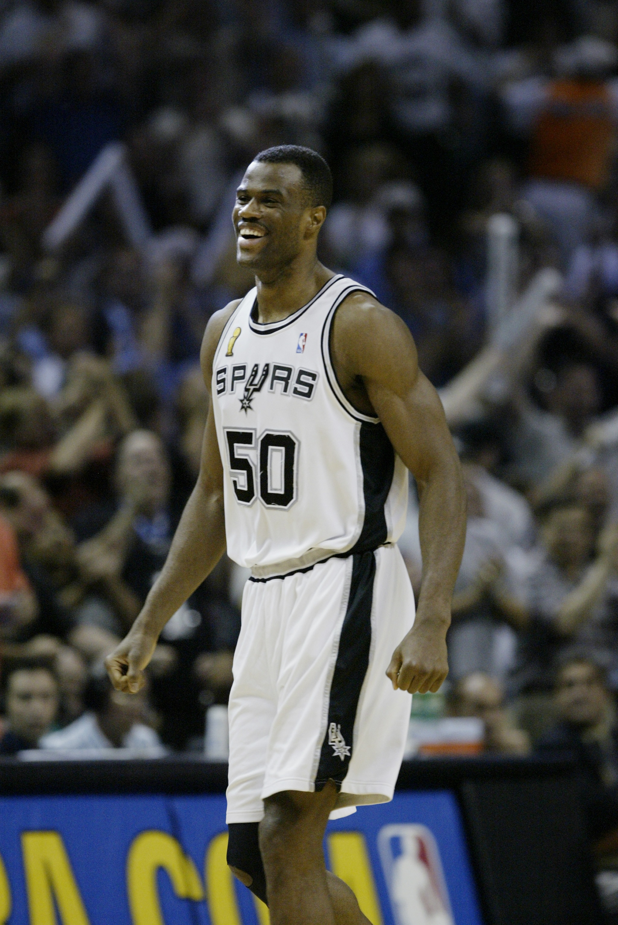 SAN ANTONIO, TX - JUNE 15: David Robinson #50 of the San Antonio Spurs celebrates in game six of the 2003 NBA Finals against the New Jersey Nets on June 15, 2003 at the SBC Center in San Antonio, Texas. The Spurs won 88-77 and defeated the Nets to win t SAN ANTONIO, TX - JUNE 15: David Robinson #50 of the San Antonio Spurs celebrates in game six of the 2003 NBA Finals against the New Jersey Nets on June 15, 2003 at the SBC Center in San Antonio, Texas. The Spurs won 88-77 and defeated the Nets to win t