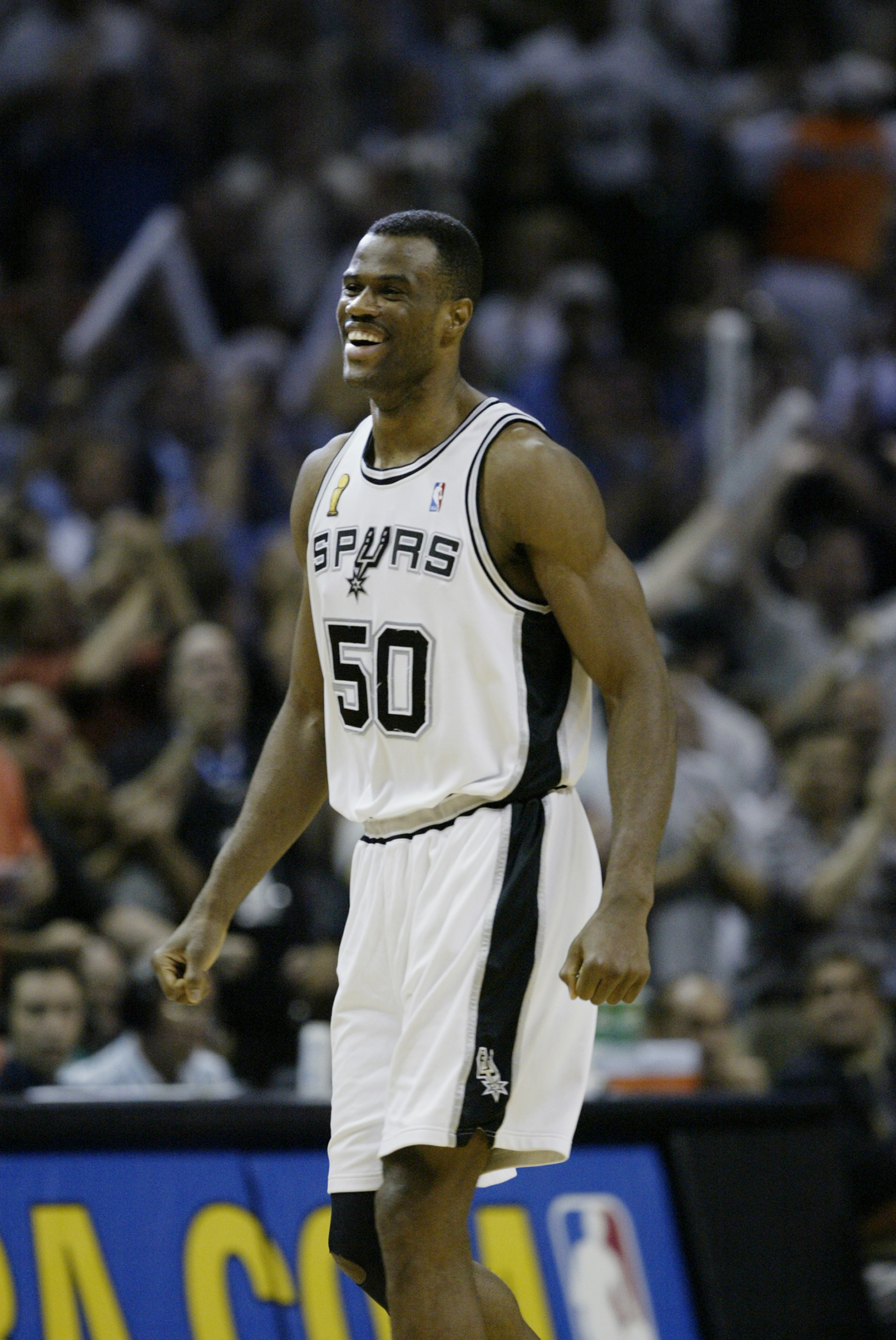 SAN ANTONIO, TX - JUNE 15: David Robinson #50 of the San Antonio Spurs celebrates in game six of the 2003 NBA Finals against the New Jersey Nets on June 15, 2003 at the SBC Center in San Antonio, Texas. The Spurs won 88-77 and defeated the Nets to win t SAN ANTONIO, TX - JUNE 15: David Robinson #50 of the San Antonio Spurs celebrates in game six of the 2003 NBA Finals against the New Jersey Nets on June 15, 2003 at the SBC Center in San Antonio, Texas. The Spurs won 88-77 and defeated the Nets to win t