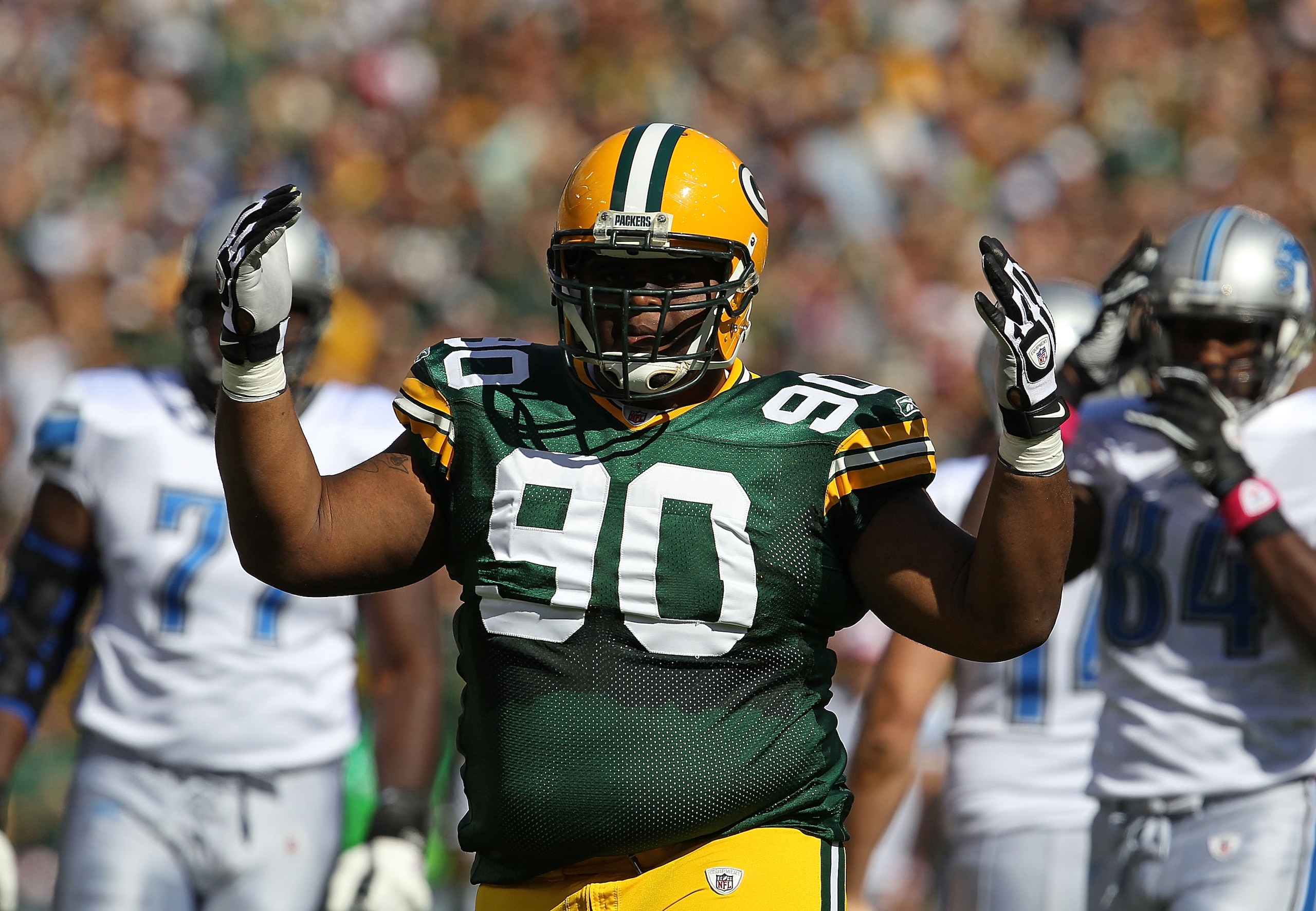 GREEN BAY, WI - OCTOBER 03: B.J. Raji #90 of the Green Bay Packers celebrates a defensive stop against the Detroit Lions at Lambeau Field on October 3, 2010 in Green Bay, Wisconsin. The Packers defeated the Lions 28-26. (Photo by Jonathan Daniel/Getty Ima