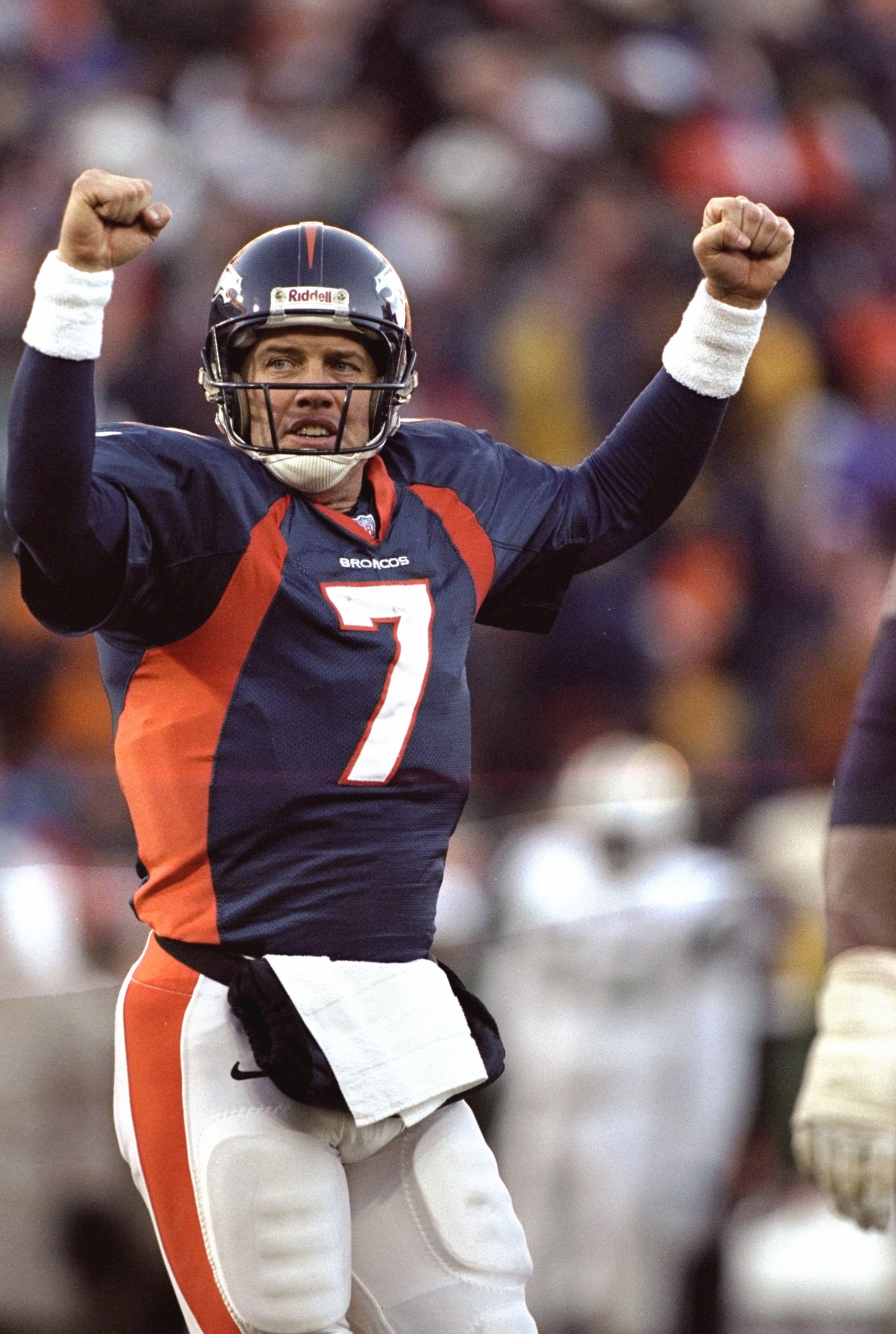 17 Jan 1999: John Elway #7 of the Denver Broncos celebrates during the AFC Championship Game against the New York Jets at Mile High Stadium in Denver, Colorado. The Broncos defeated the Jets 23-10. Mandatory Credit: Brian Bahr  /Allsport