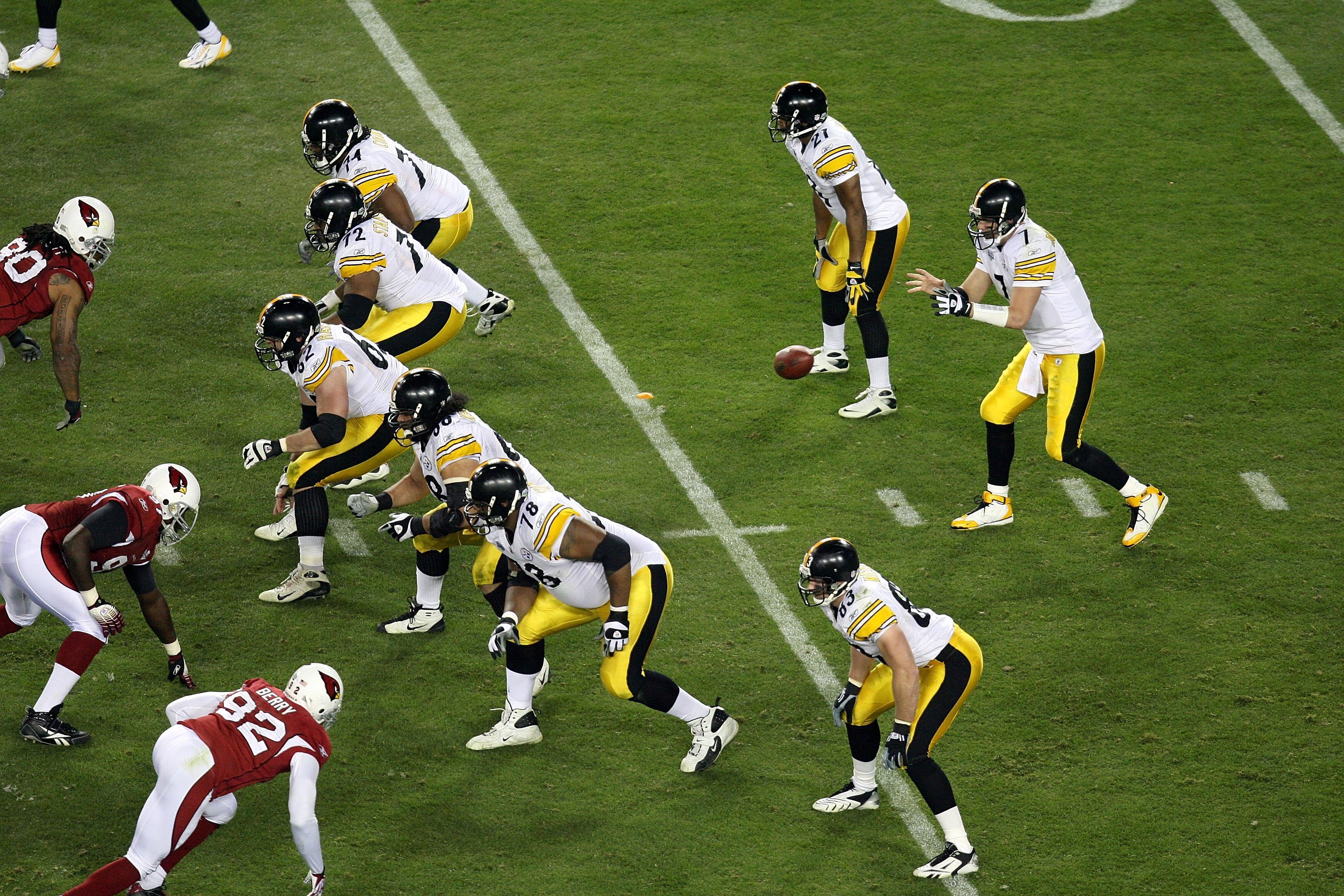 TAMPA, FL - FEBRUARY 01:  Quarterback Ben Roethlisberger #7 of the Pittsburgh Steelers awaits the snap in the shotgun formation behind (top to bottom) Willie Colon #74, Darnell Stapleton #72, Justin Hartwig #62, Chris Kemoeatu #68, Max Starks #78 and Heat