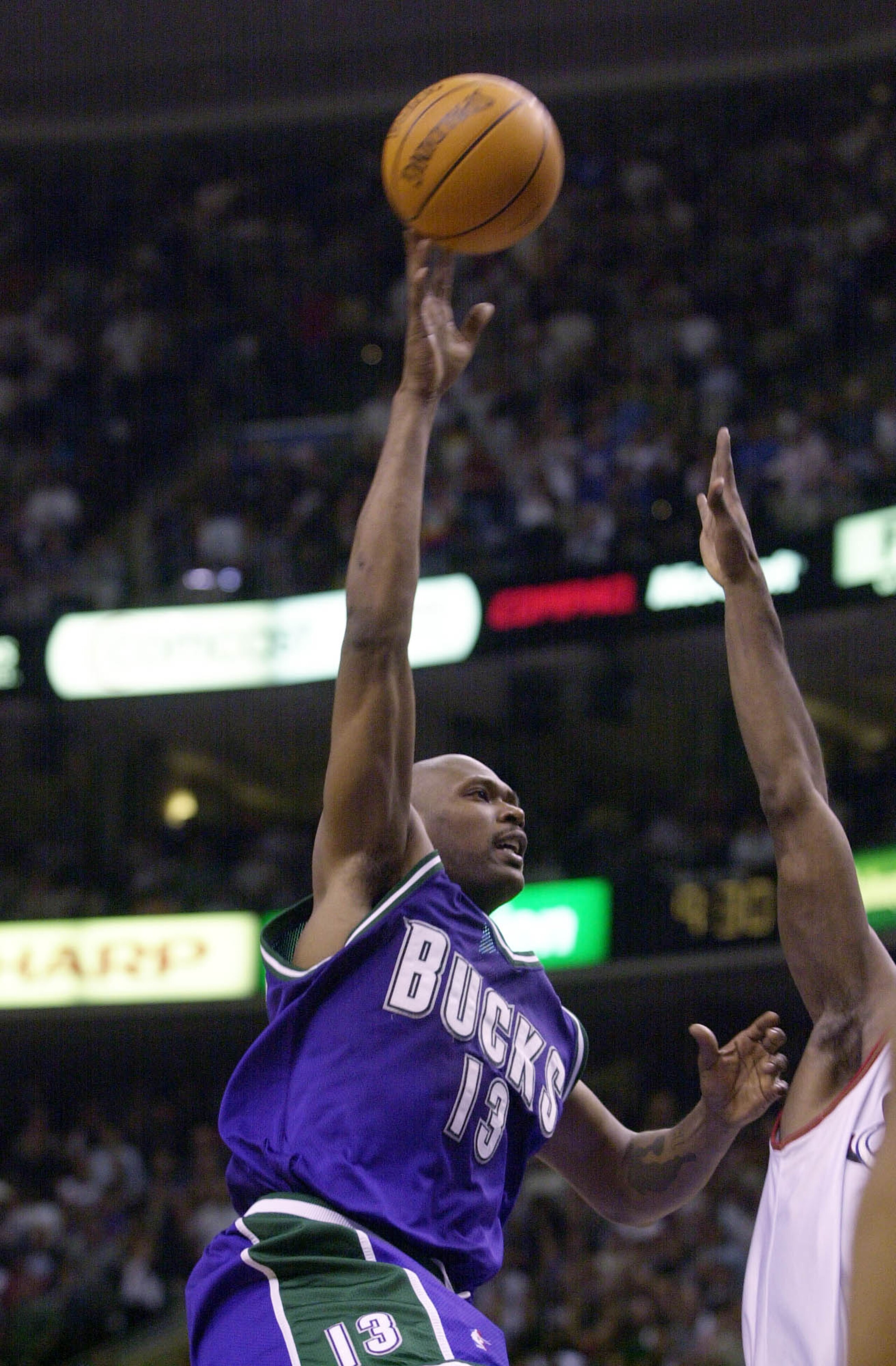 3 Jun 2001: Glenn Robinson #13 of the Milwaukee Bucksputs a shot up in game seven of the eastern conference finals against the Philadephia 76ers at the First Union Center in Philadephia, Pennsylvania.  The 76ers won 85-71 to take the series 4-3.  DIGITAL