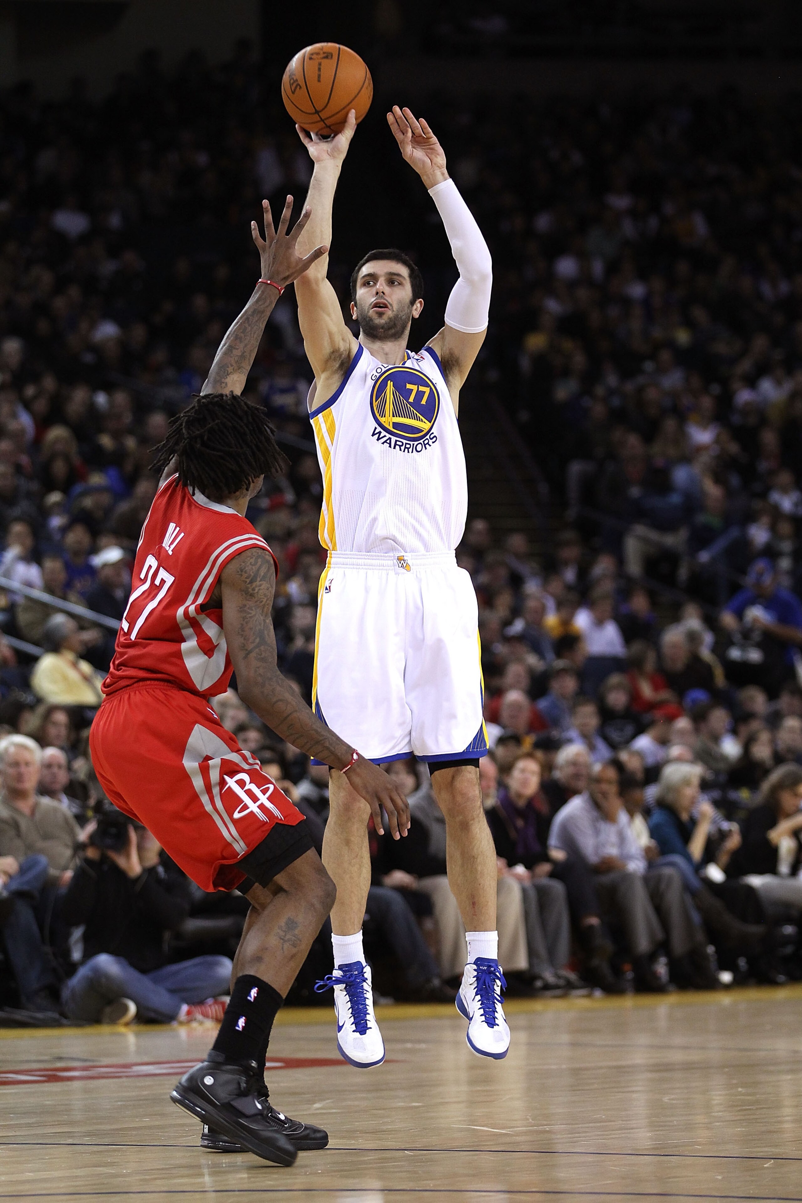 OAKLAND, CA - DECEMBER 20:  Vladimir Radmanovic #77 of the Golden State Warriors in action against the Houston Rockets at Oracle Arena on December 20, 2010 in Oakland, California. NOTE TO USER: User expressly acknowledges and agrees that, by downloading a