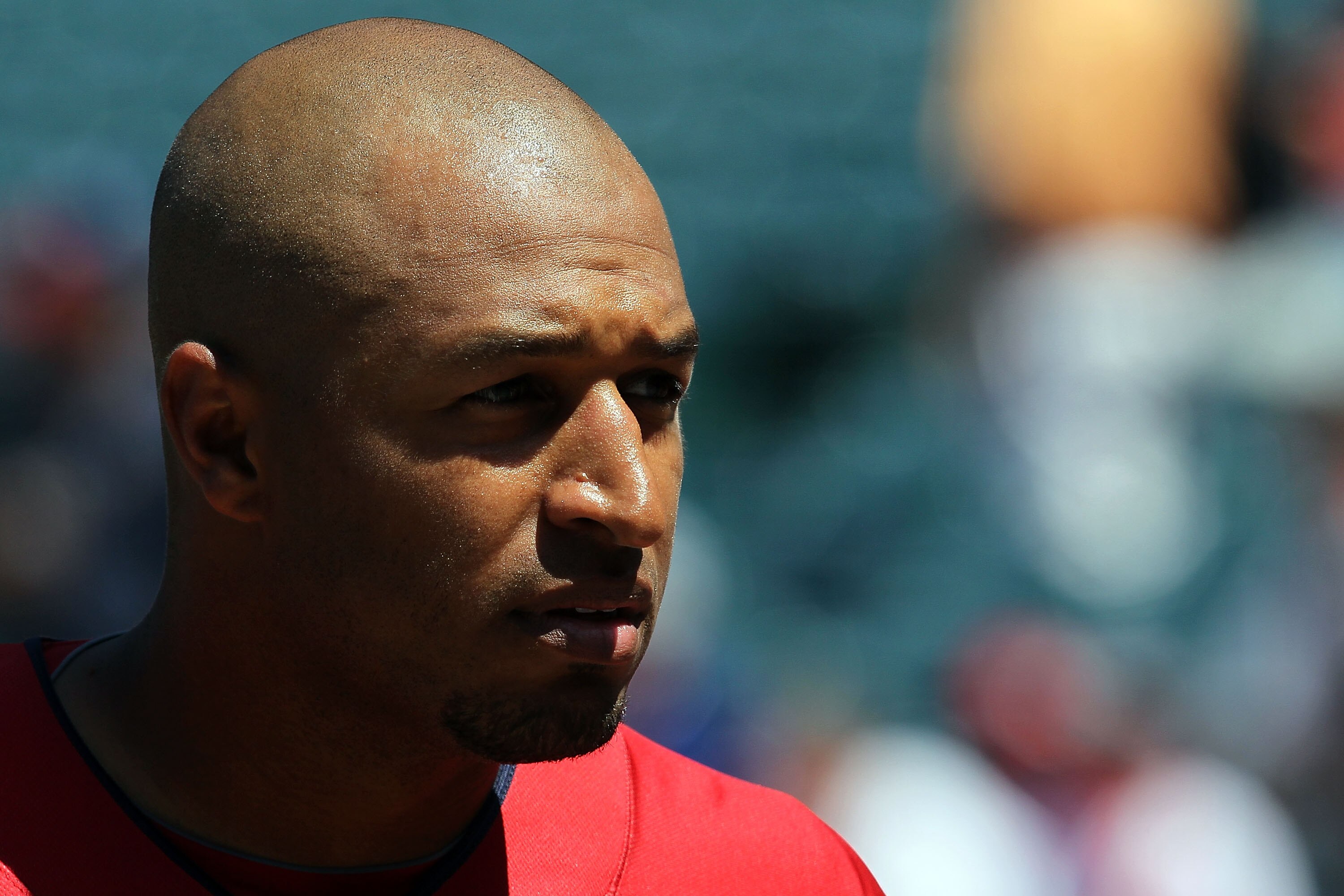 ANAHEIM, CA - JULY 12:  American League All-Star Vernon Wells #10 of the Toronto Blue Jays looks on during Gatorade All-Star Workout Day at Angel Stadium of Anaheim on July 12, 2010 in Anaheim, California.  (Photo by Stephen Dunn/Getty Images)